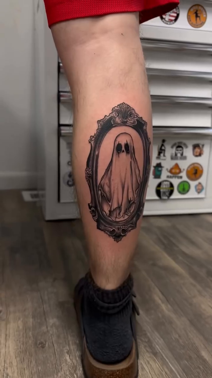 Ghost in a frame realism tattoo by Alyssa Turner