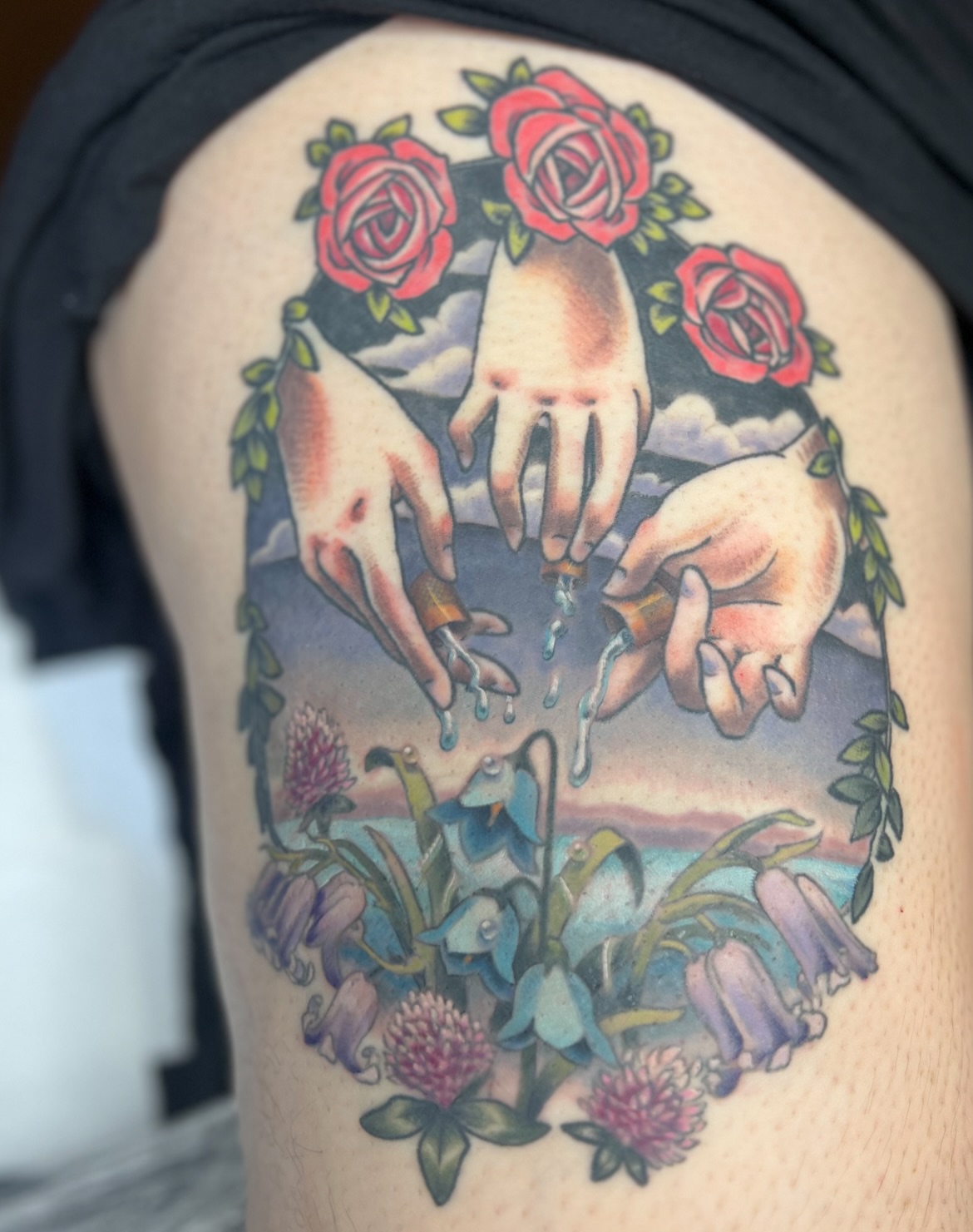 Hands and roses American traditional tattoo on the shoulder by 𝗕𝗿𝗮𝗻𝗱𝘆  𝗪𝗼𝗼𝗱𝗳𝗼𝗿𝗱
