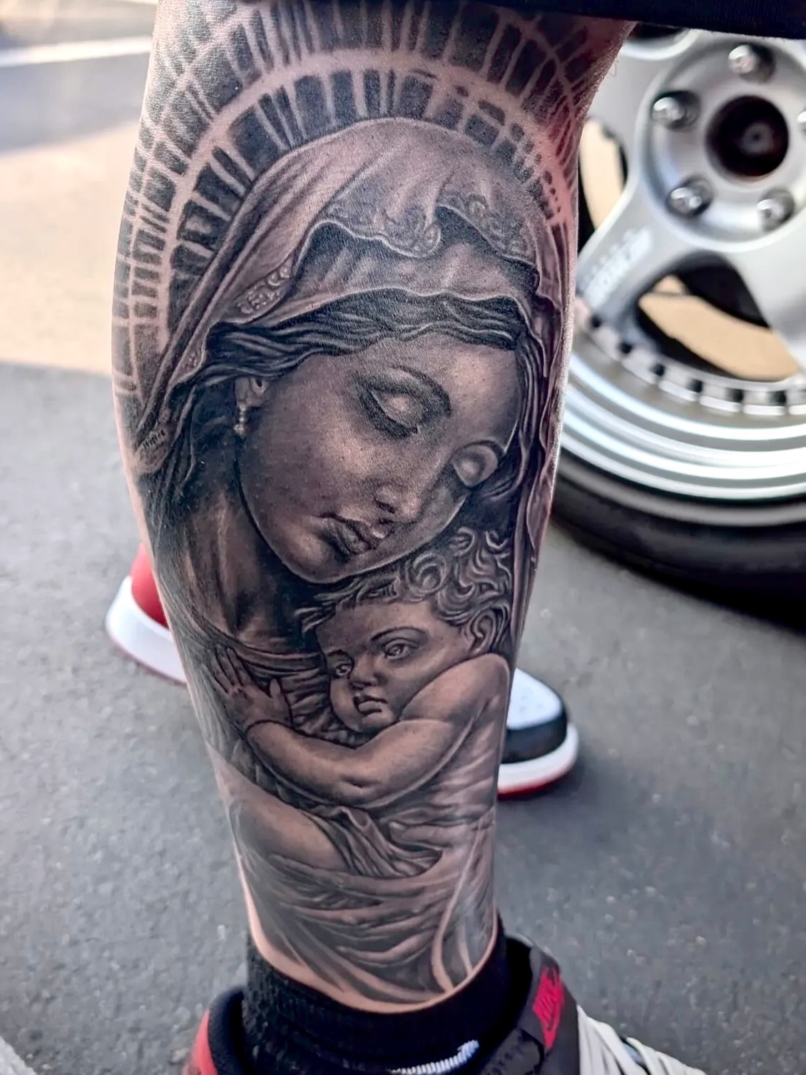 Statue of liberty and child realism tattoo on the forearm by John Ayson, Murrieta, California