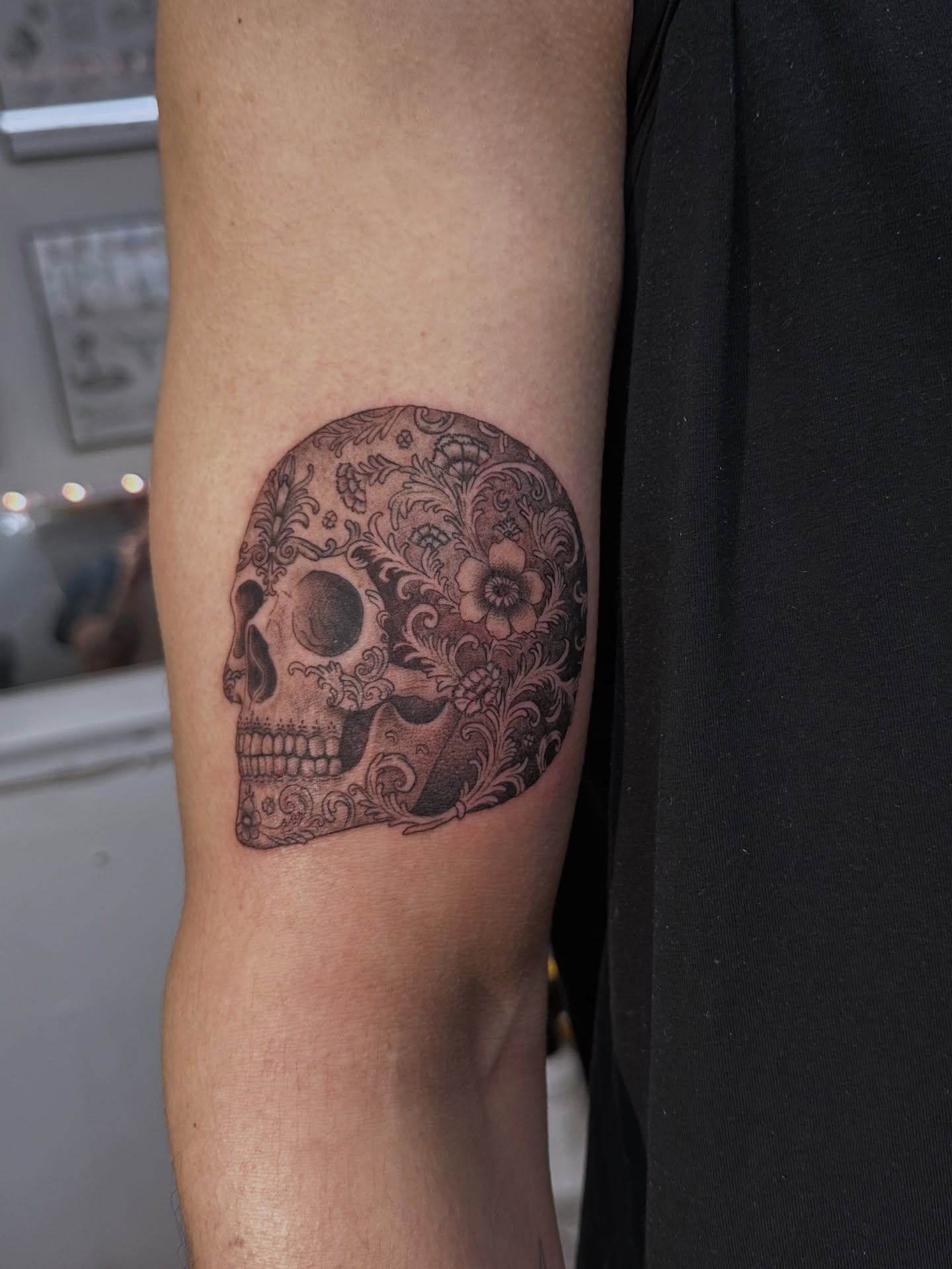Skull black and grey tattoo on the forearm by Piccolino, Cambridge, Massachusetts
