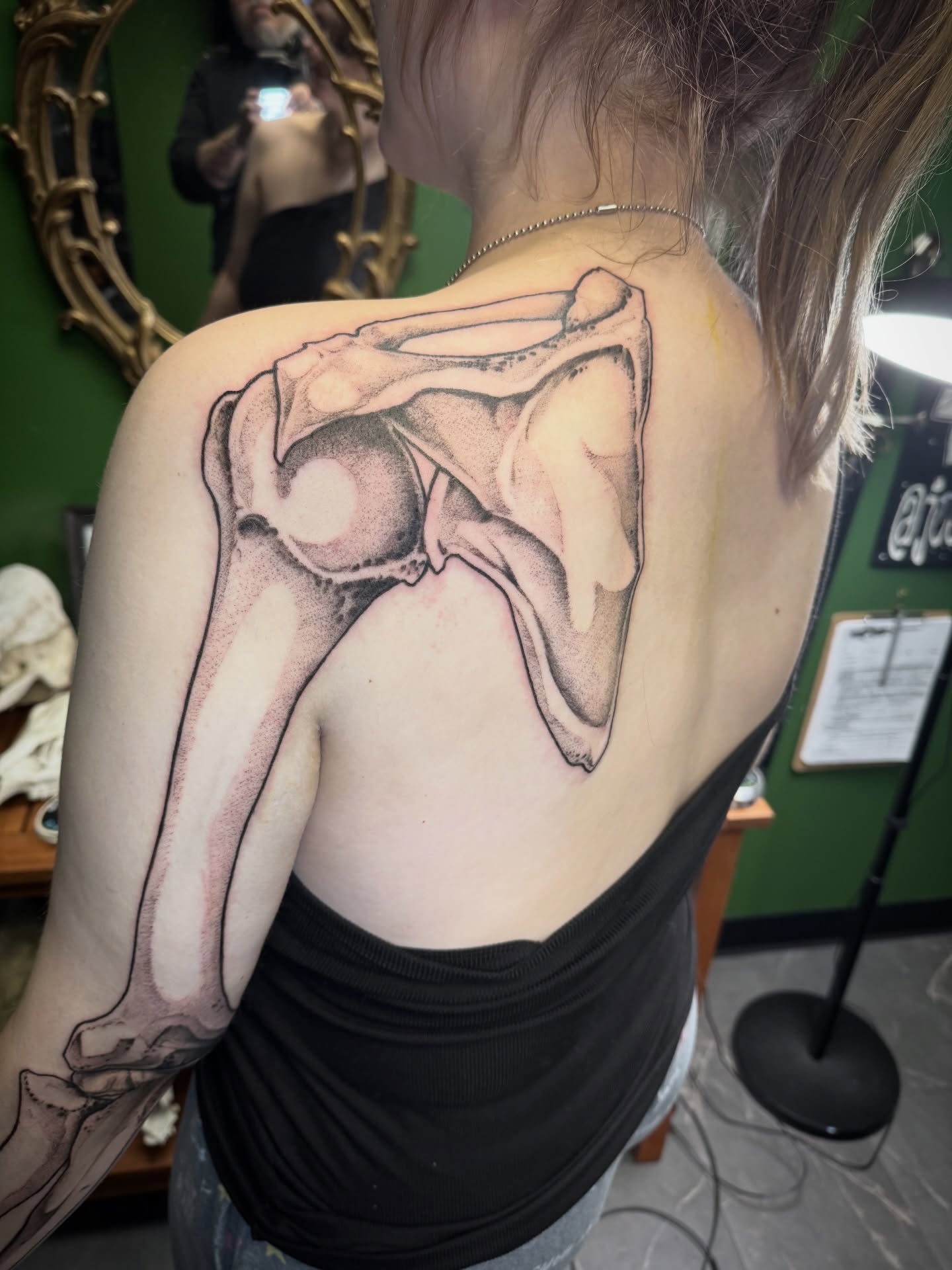 Hip joint realism tattoo on the back by Joe Hall