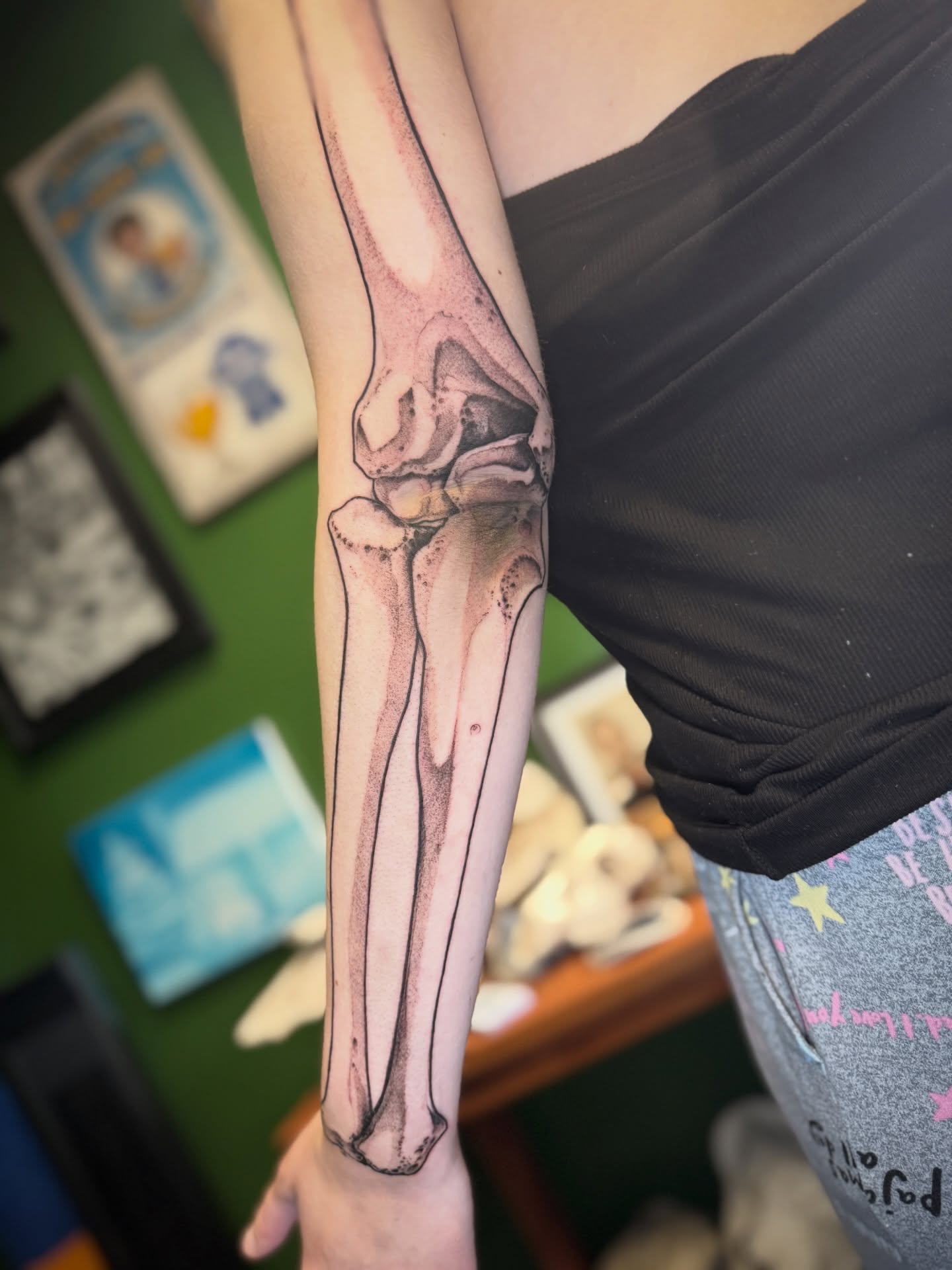 Bone structure realism tattoo on the forearm by Joe Hall