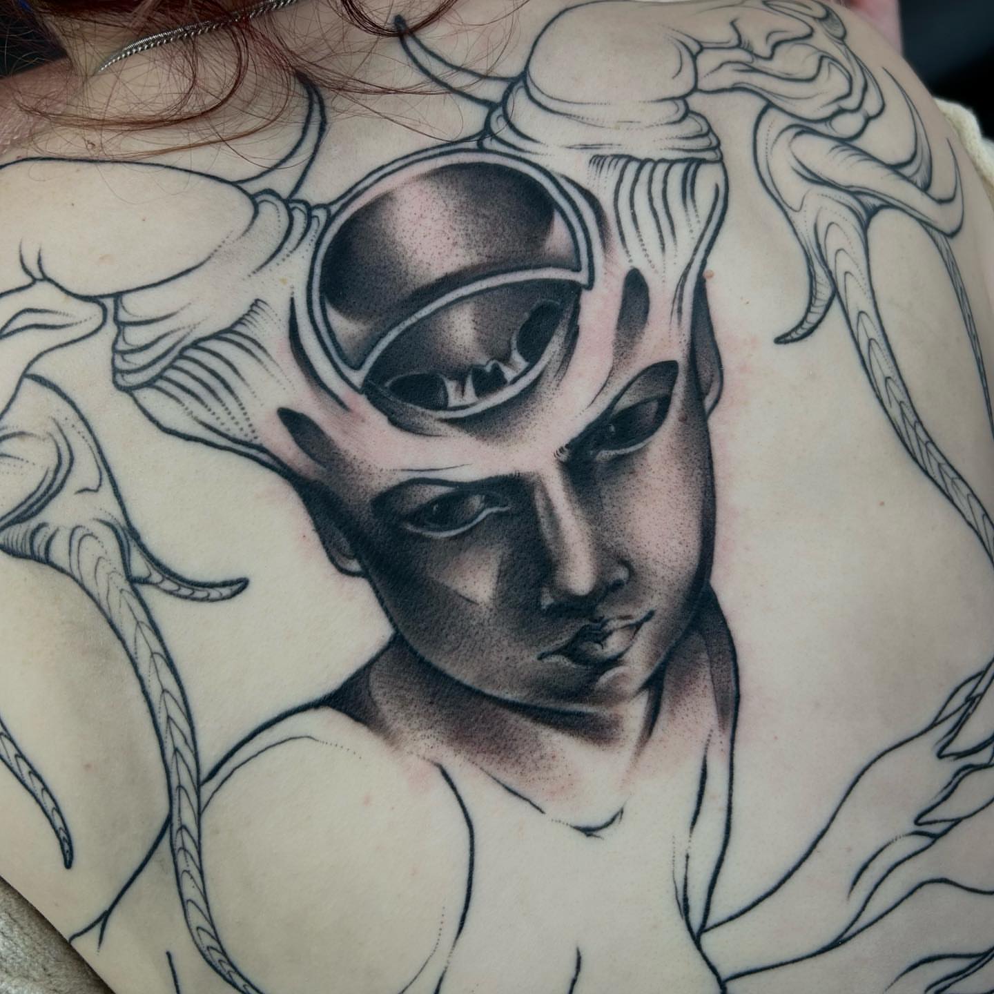 Woman with helmet realism tattoo on the shoulder by Tatijana., Kettering, Ohio