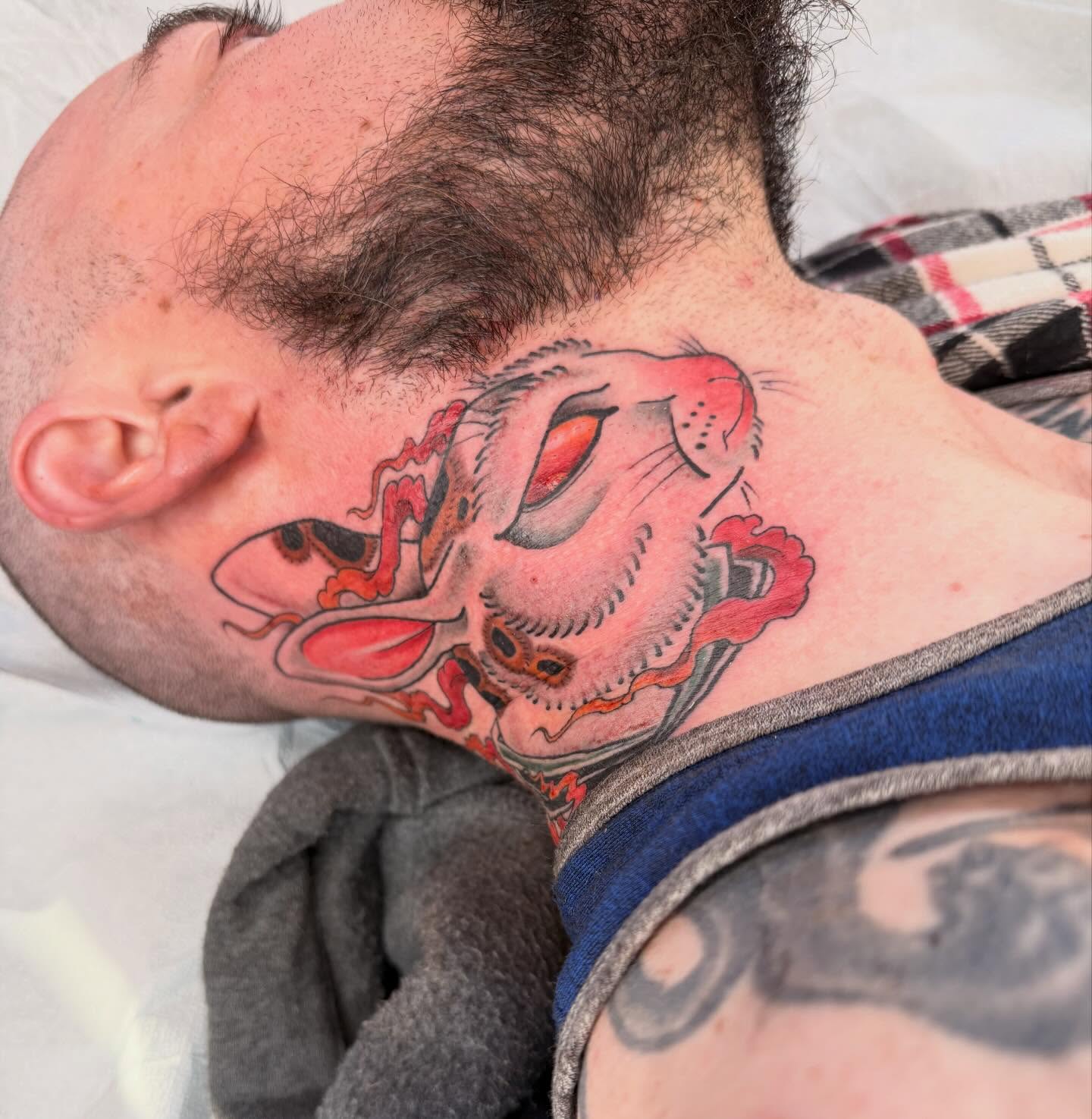 Lion japanese irezumi tattoo on the neck by Mika Clairissa