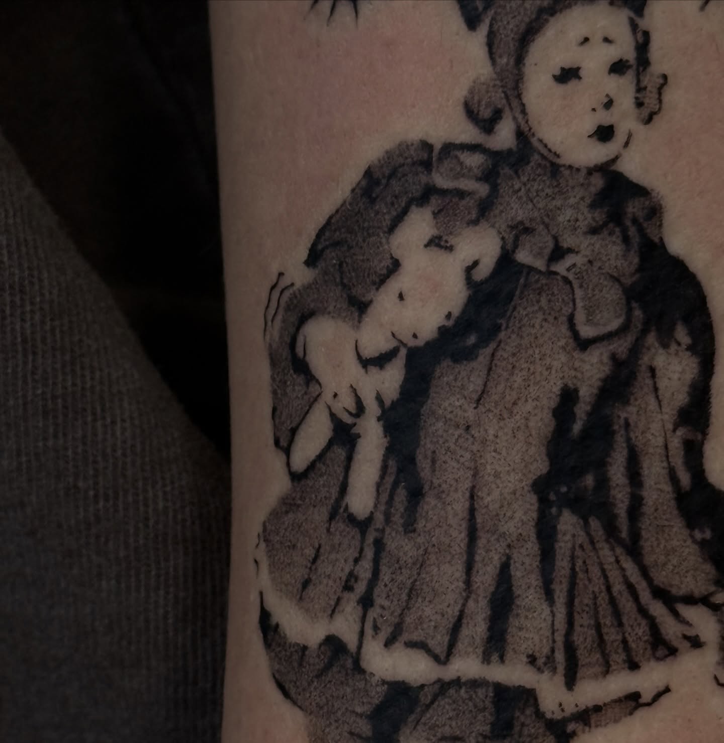Doll black and grey tattoo on the forearm by πΈππππ