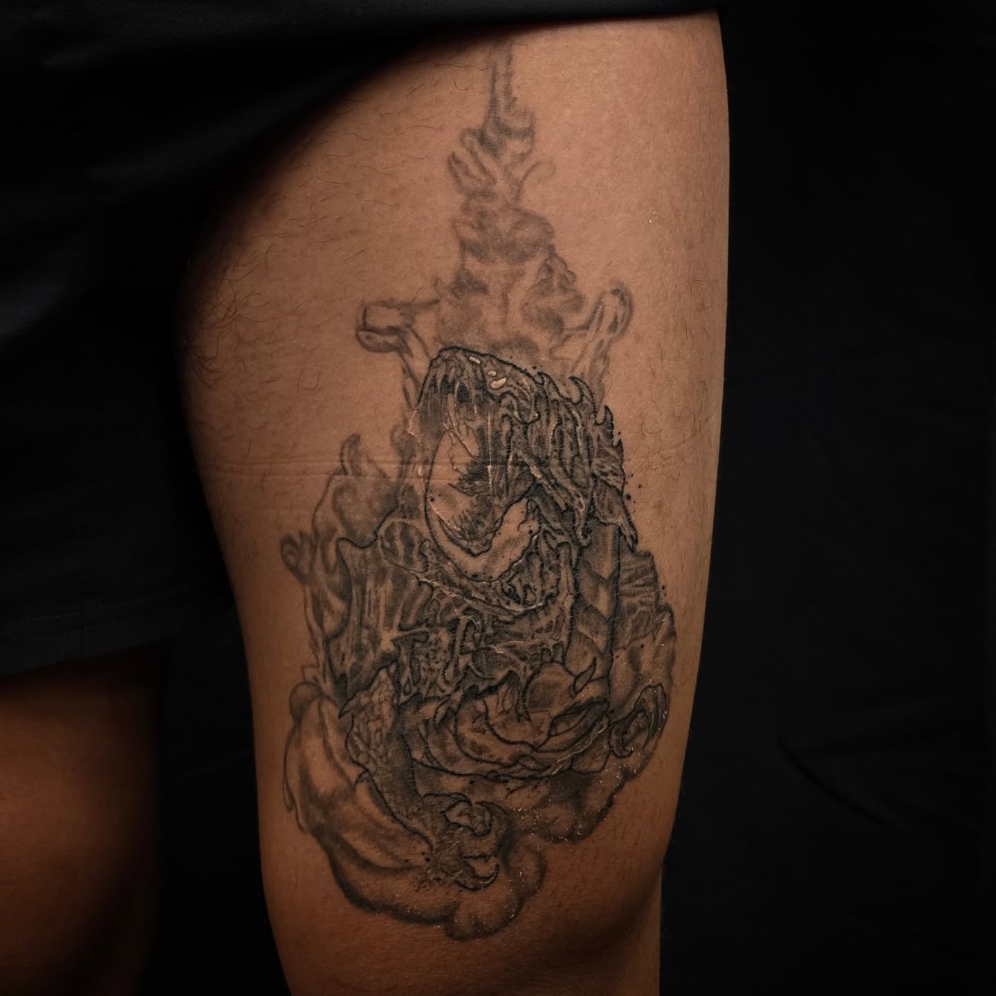 Flame and dragon realism tattoo on the thigh by Linda Marroum, Morningside, Maryland