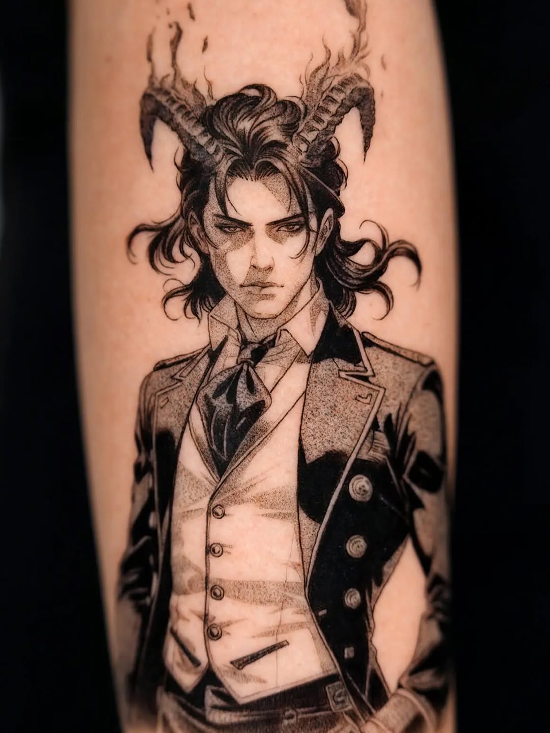 Demon character in suit anime tattoo on the forearm by Jun