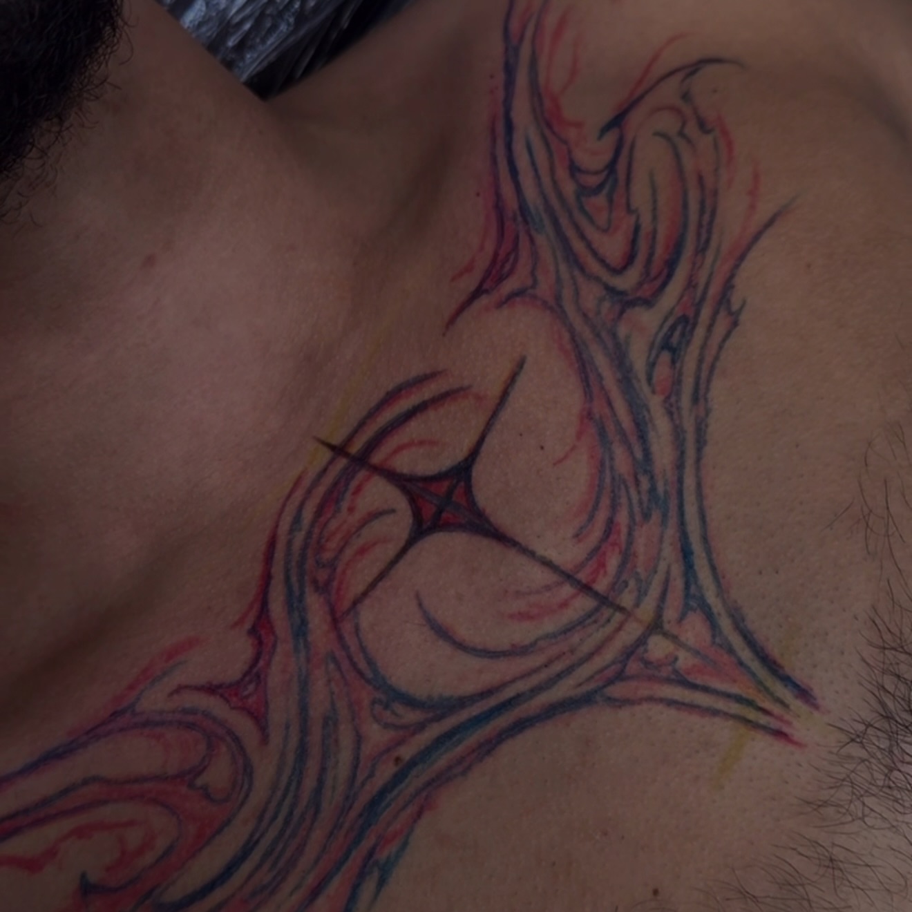 Abstract swirls tattoo on the chest by V เผ๏ธ ๐๐๐ญ๐ญ๐จ๐จ ๐๐ซ๐ญ๐ข๐ฌ๐ญ