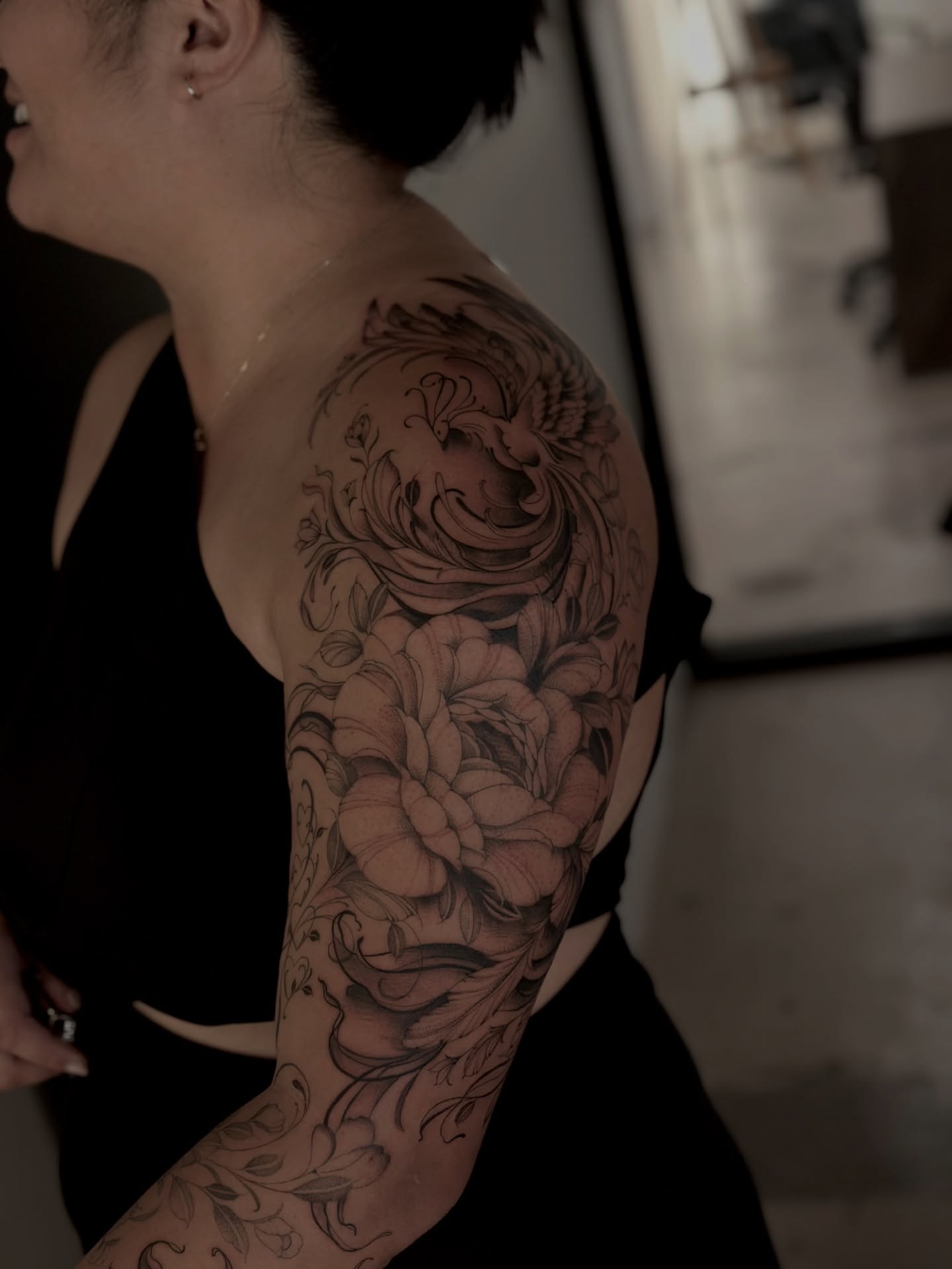 Floral realism tattoo on the upper arm by ᴍɪᴄʜᴇʟʟᴇ, New York, New York