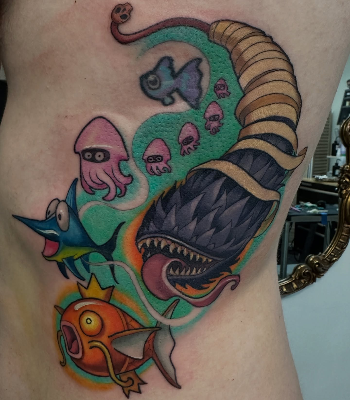 Undersea creatures new school tattoo on the thigh by John Tarrao, Berwyn, Pennsylvania