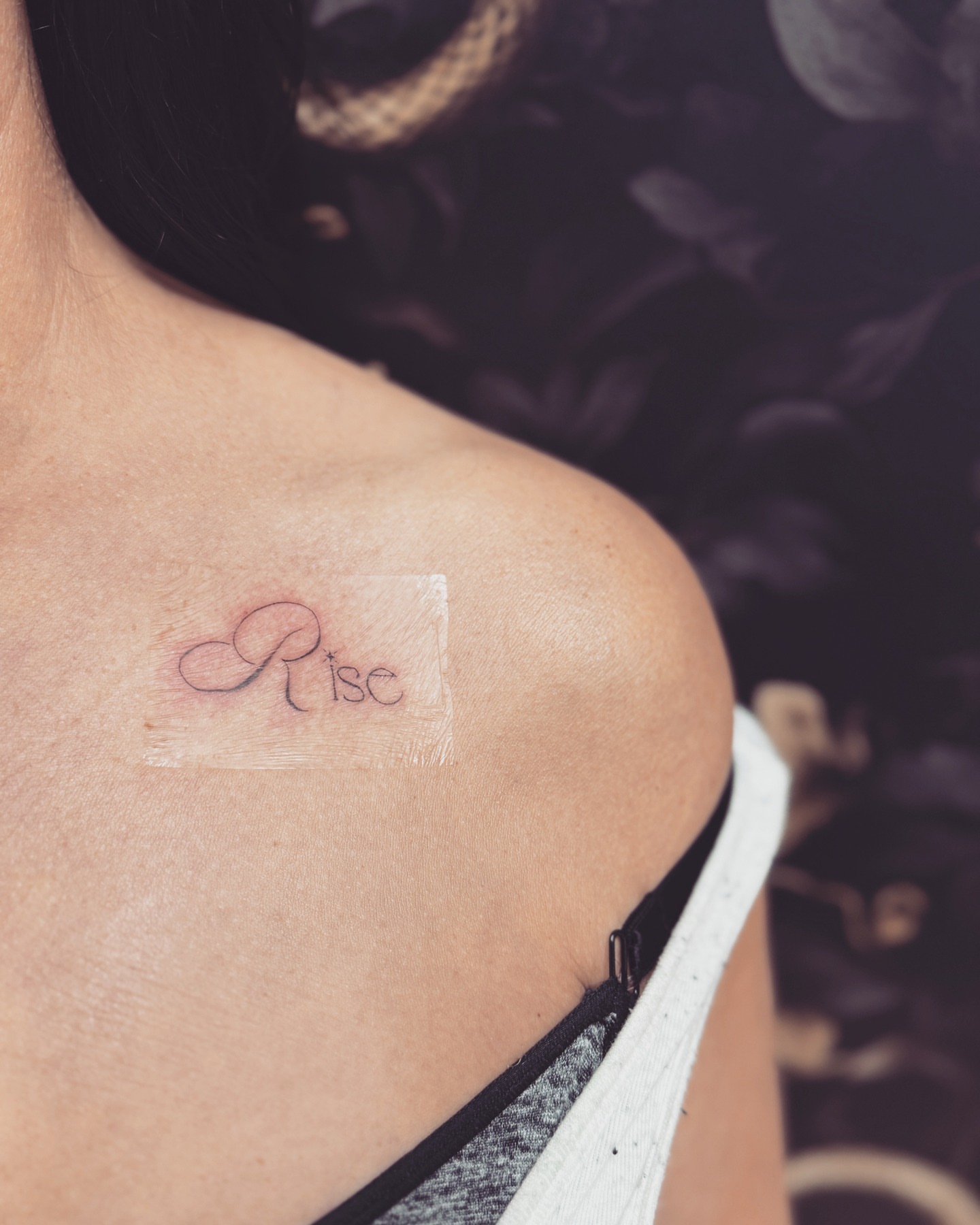 Rise lettering script tattoo on the shoulder by Fineline Tattoos π€ Hailey L.