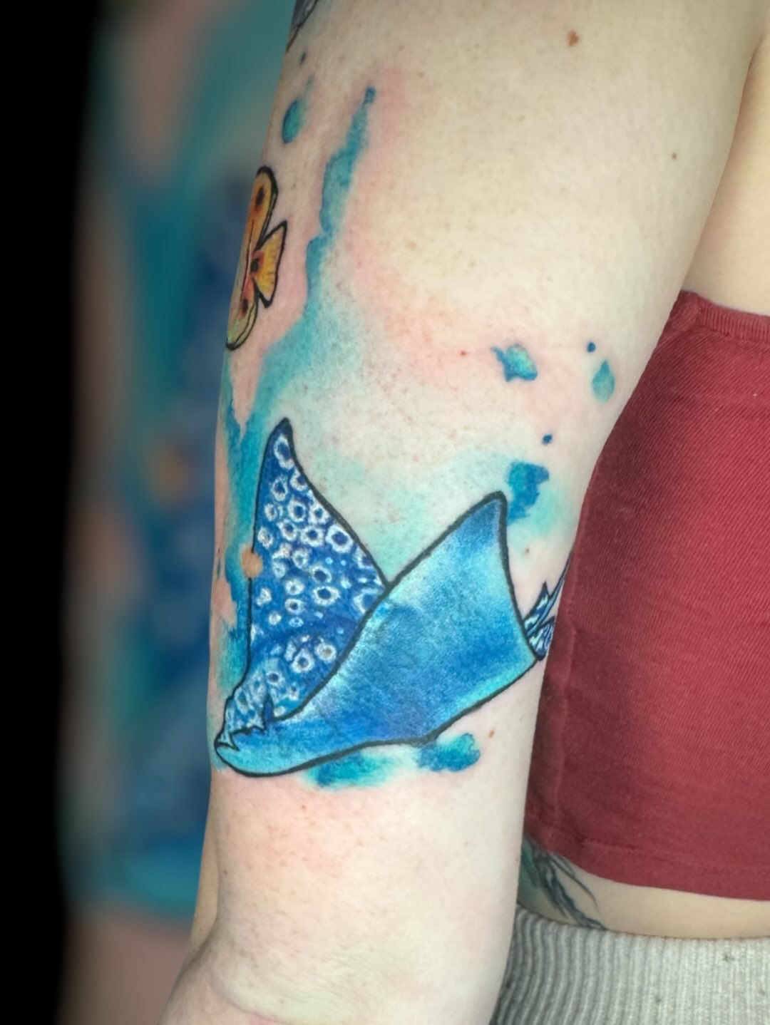 Ray fish watercolor tattoo on the forearm by Paula.p.tattoos