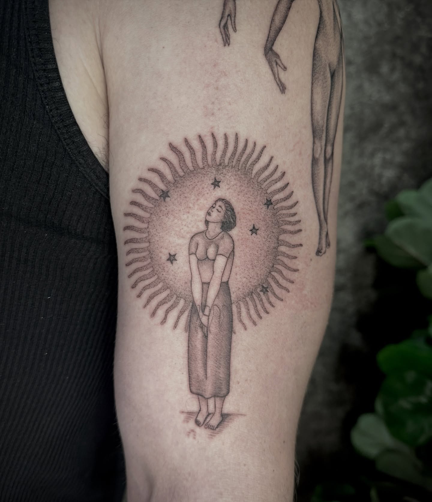 Woman under celestial sun dotwork tattoo on the forearm by Carmen Figueroa, New York, New York