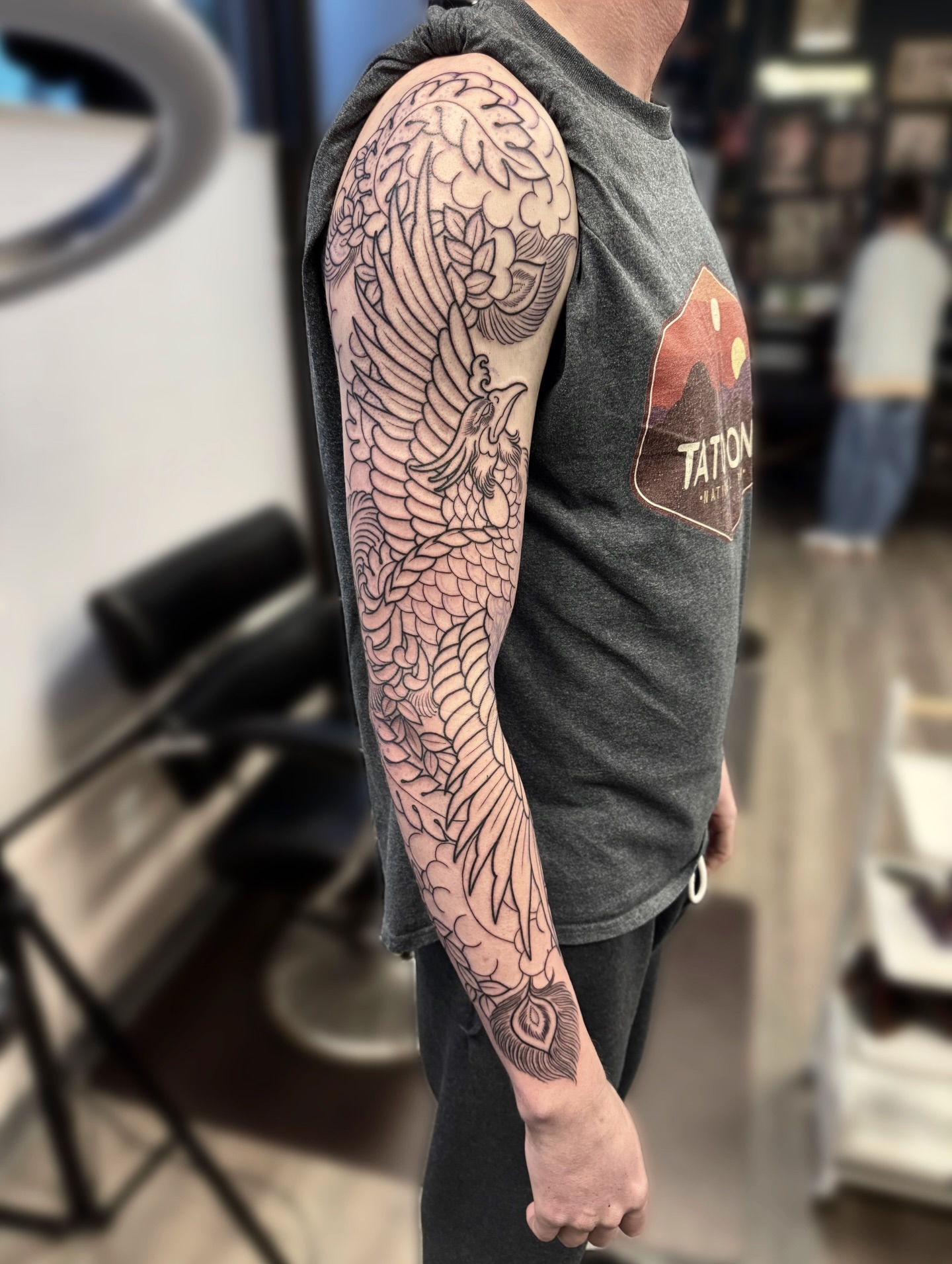 Phoenix japanese irezumi tattoo on the upper arm by Anna Wall