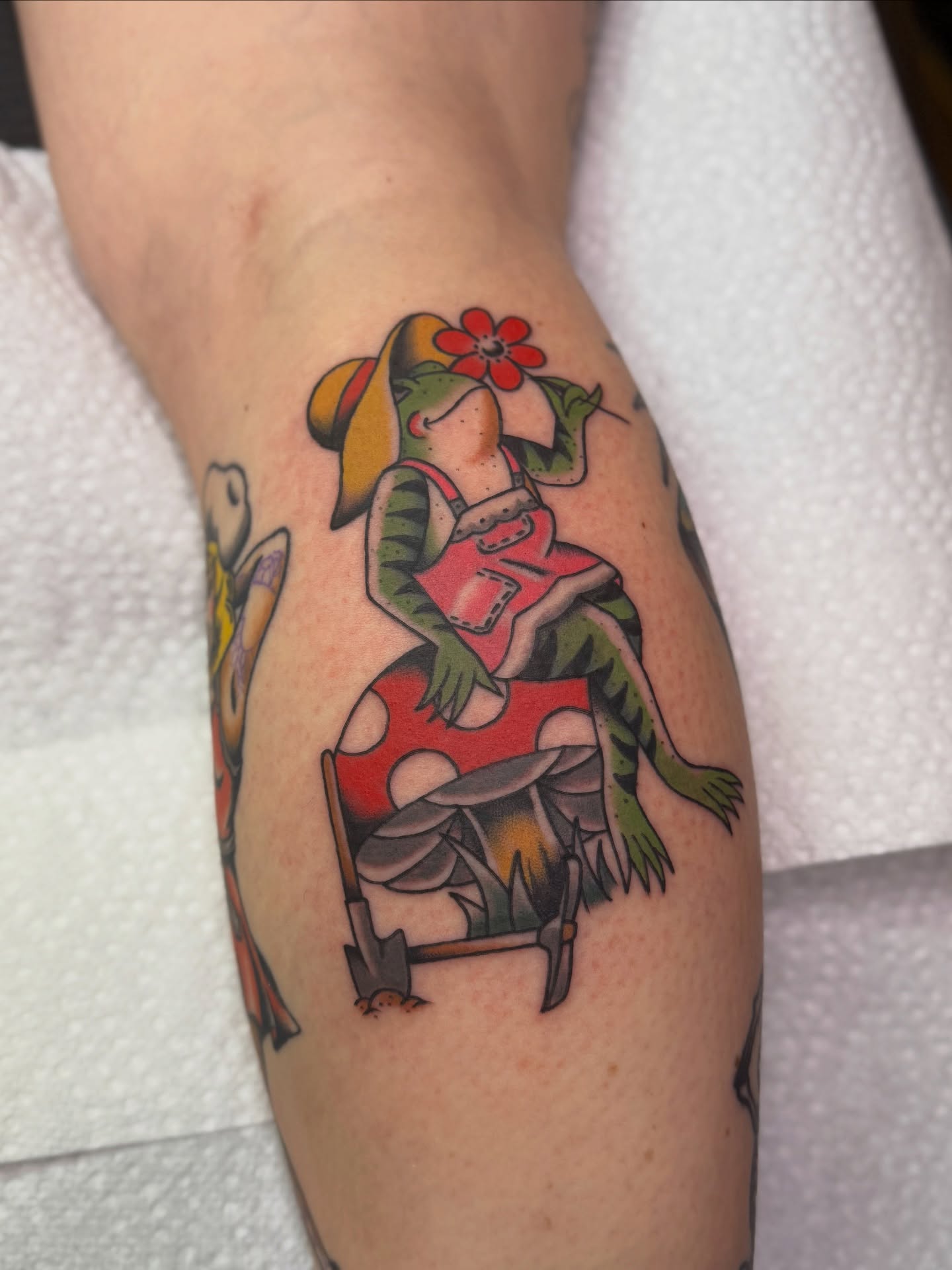 Frog in overalls American traditional tattoo on the forearm by Ethan, Toledo, Ohio