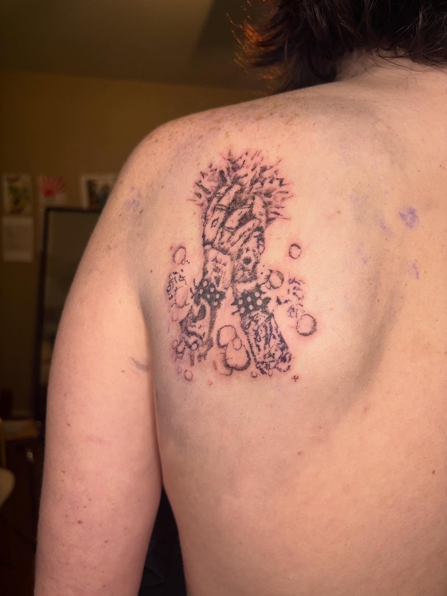 Abstract creature dotwork tattoo on the back by Swag Originator