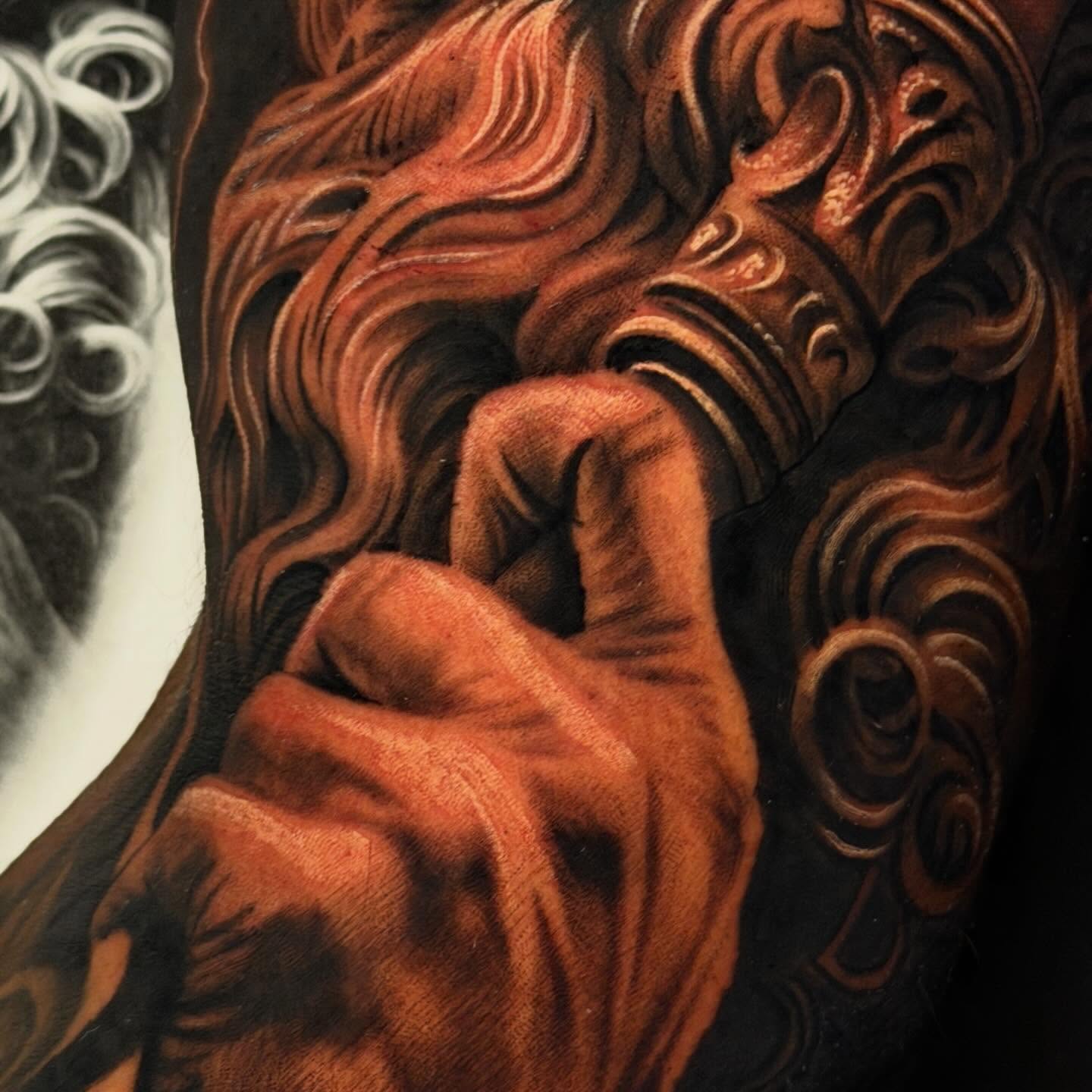 Hand with ornate sleeve American traditional tattoo on the forearm by Jorge Hernandez