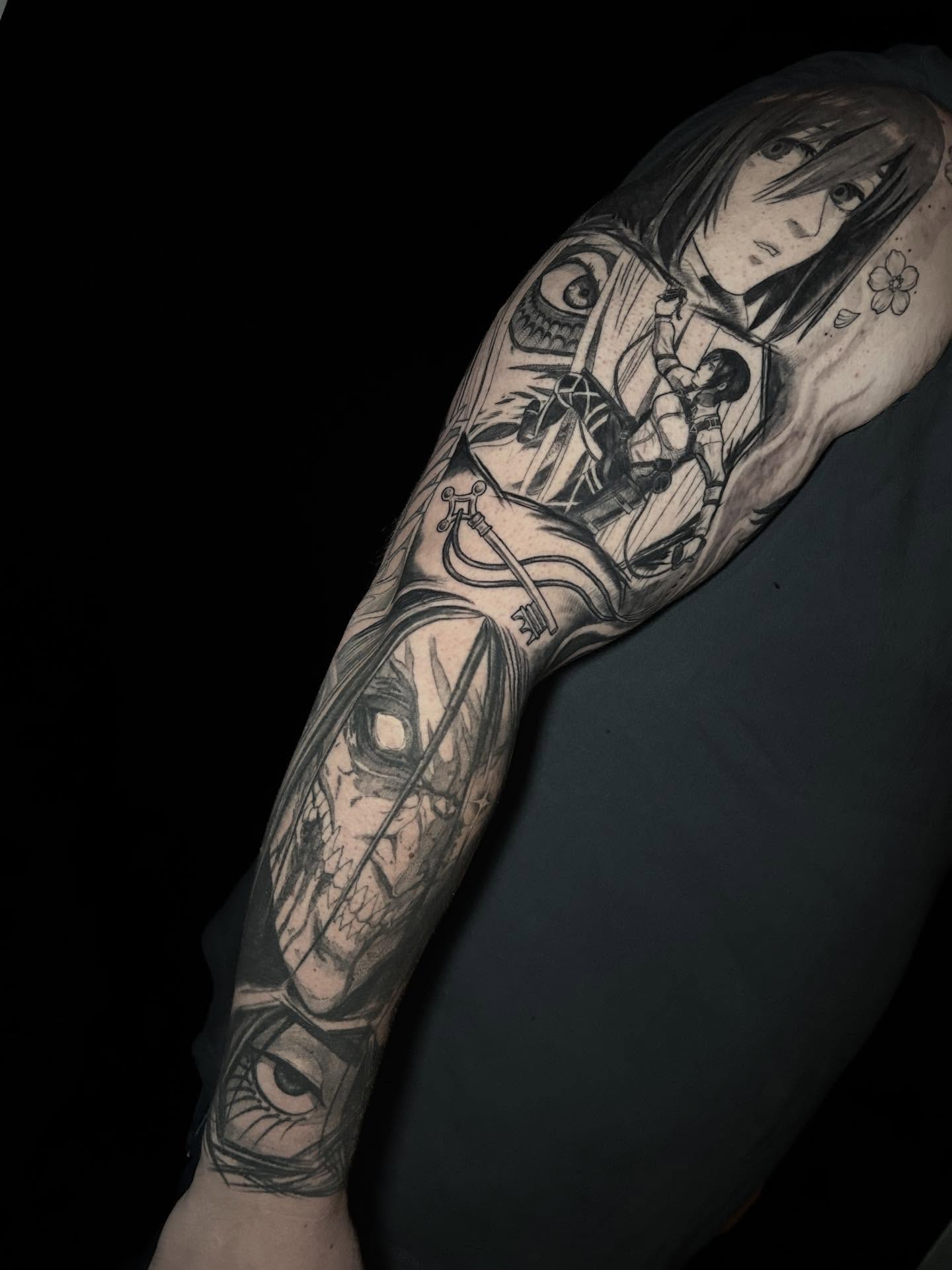 Anime character anime tattoo on the forearm by Ashlee Mshar