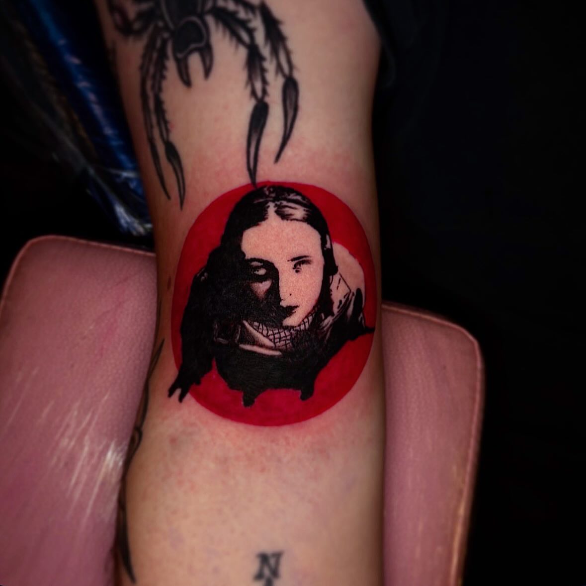 Portrait realism tattoo on the forearm by Haley Byers