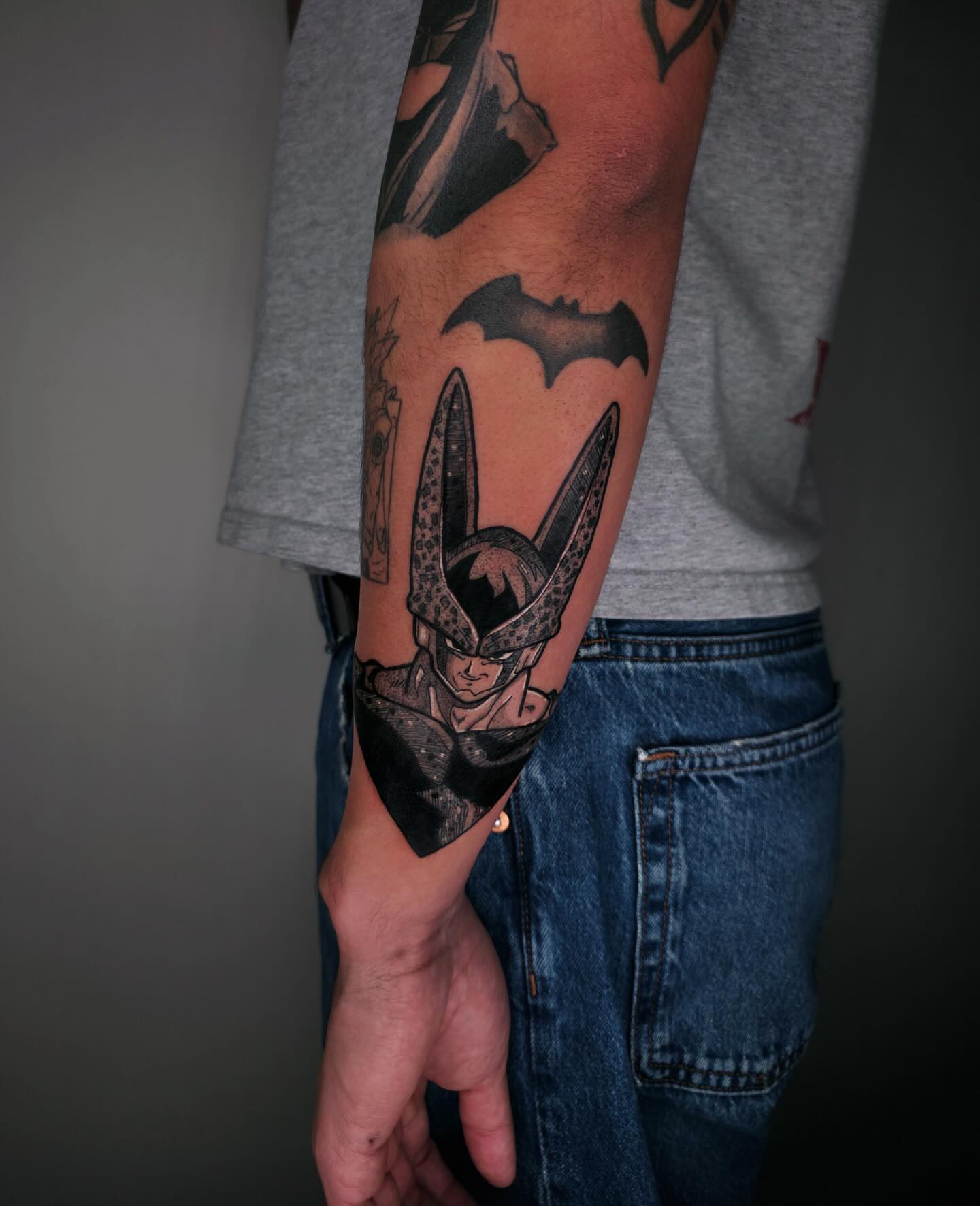 Batman helmet black and grey tattoo on the forearm by ☻ Addie