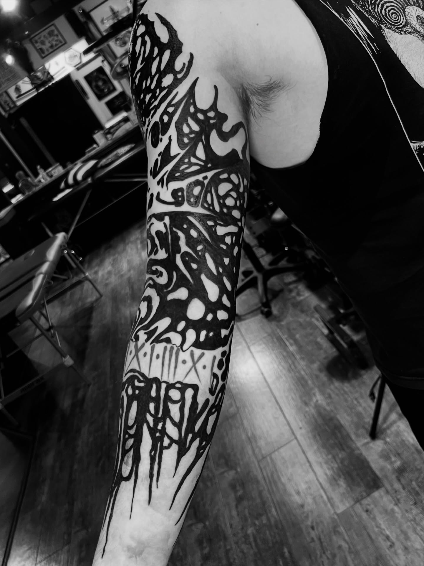 Abstract pattern geometric tattoo on the forearm by Trevor Berry