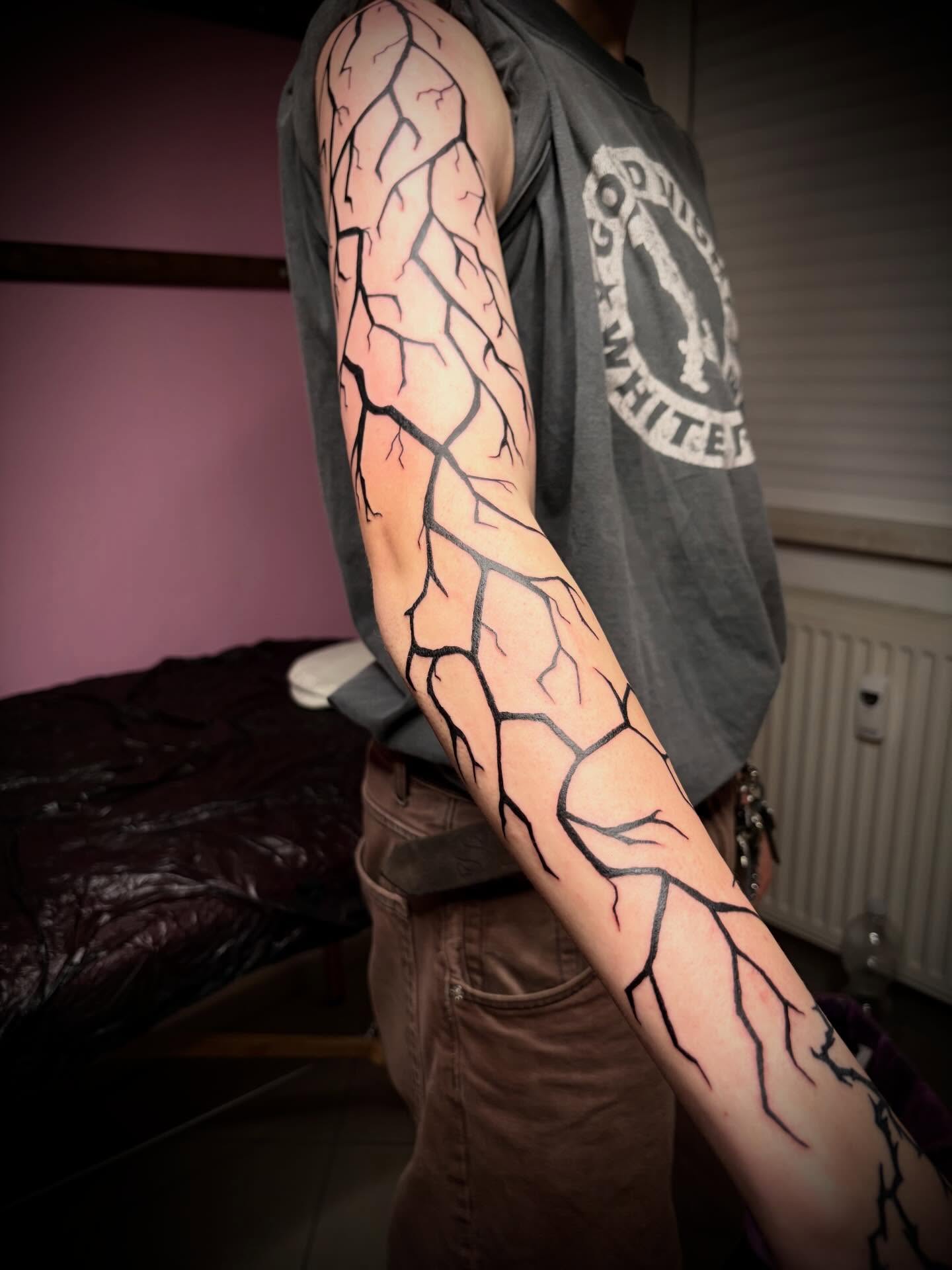 Branch geometric tattoo on the forearm by lu ๐