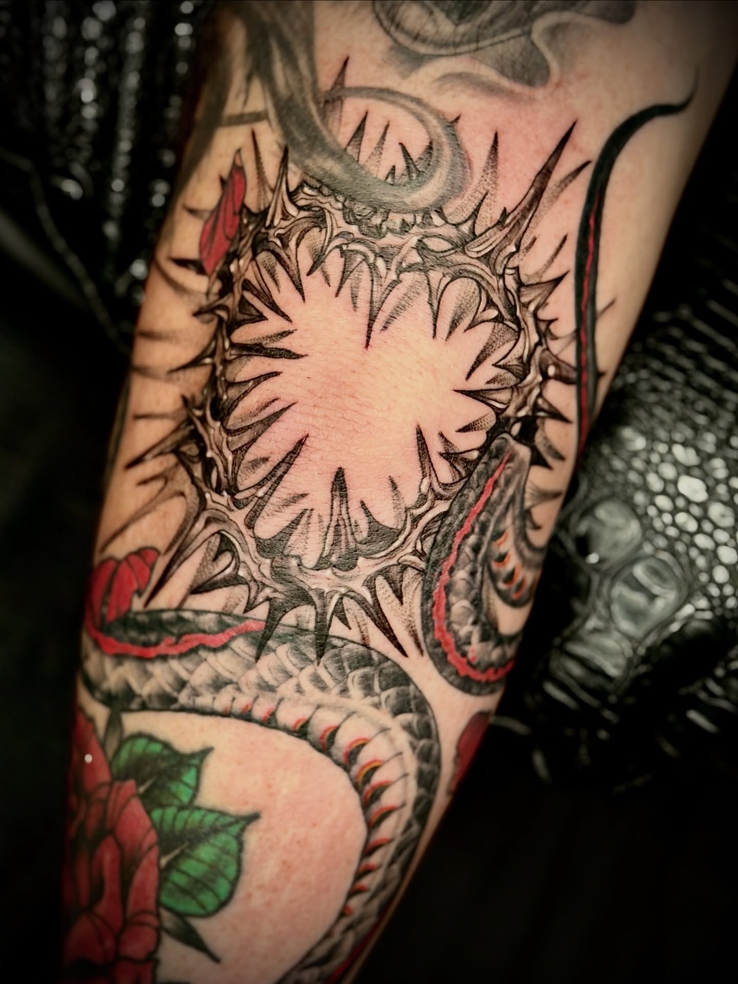 Dragon and sun American traditional tattoo on the forearm by Giovanna Kline