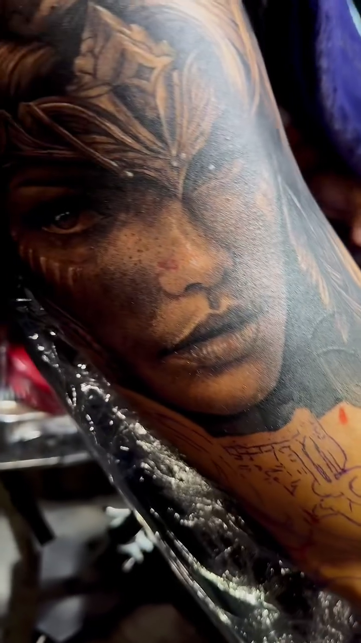 Tattoo by @elmertattoo1 — realism, black_and_grey