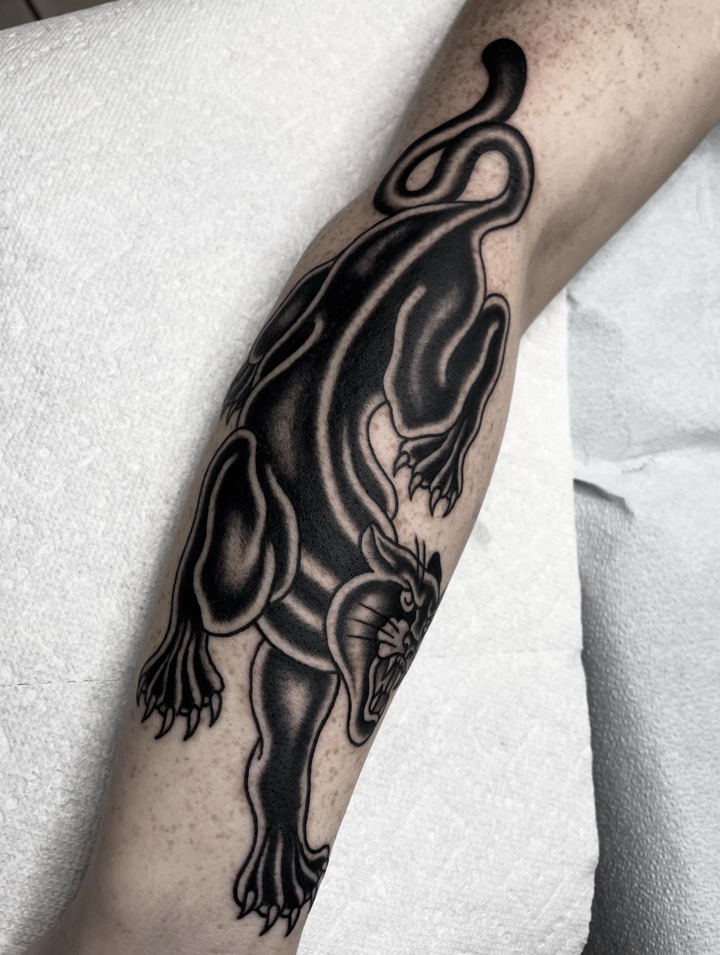 Cat black and grey tattoo on the forearm by Kat, Sacramento, California