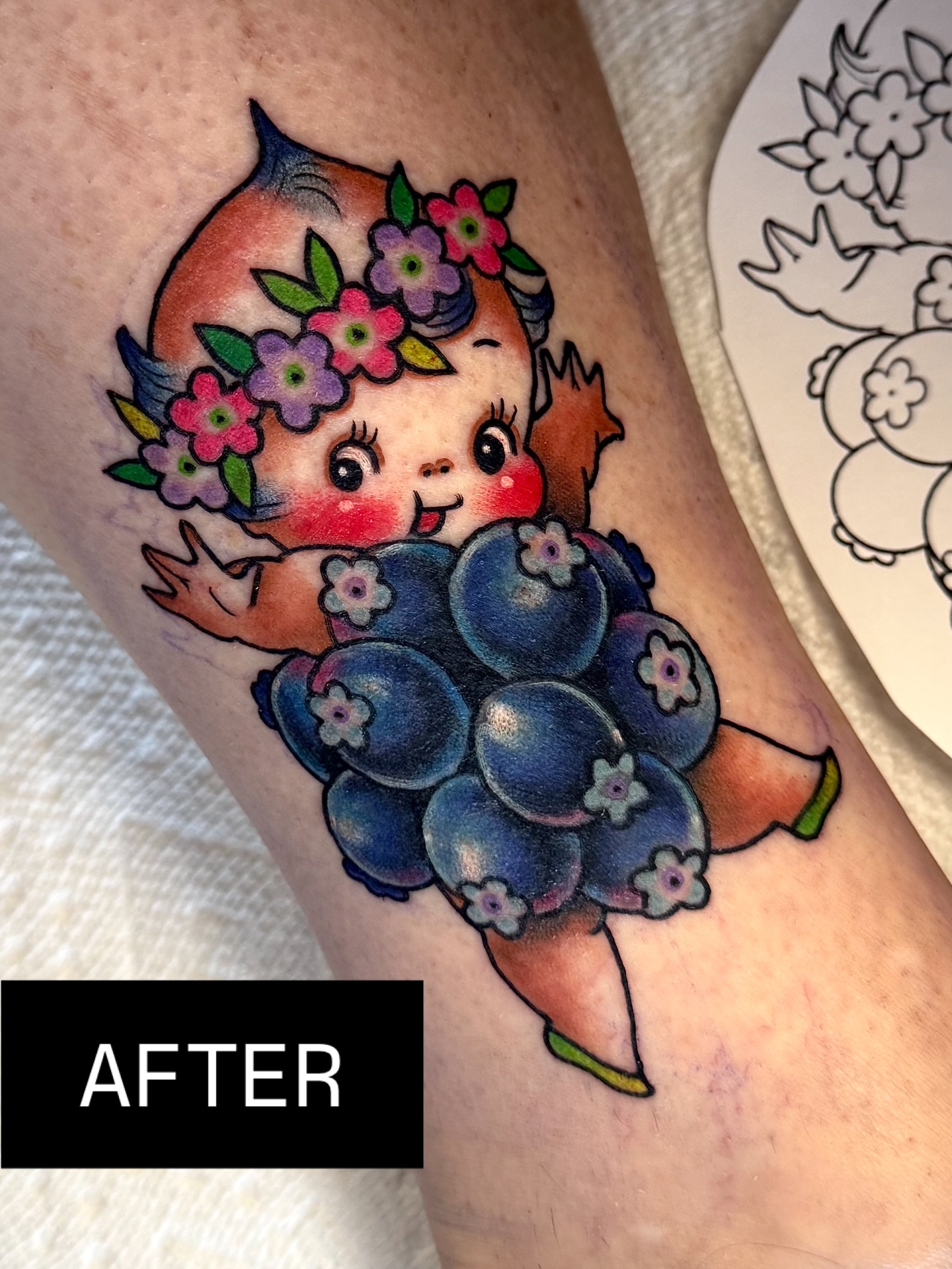 Blueberry girl new school tattoo on the forearm by Stacey Martin Smith