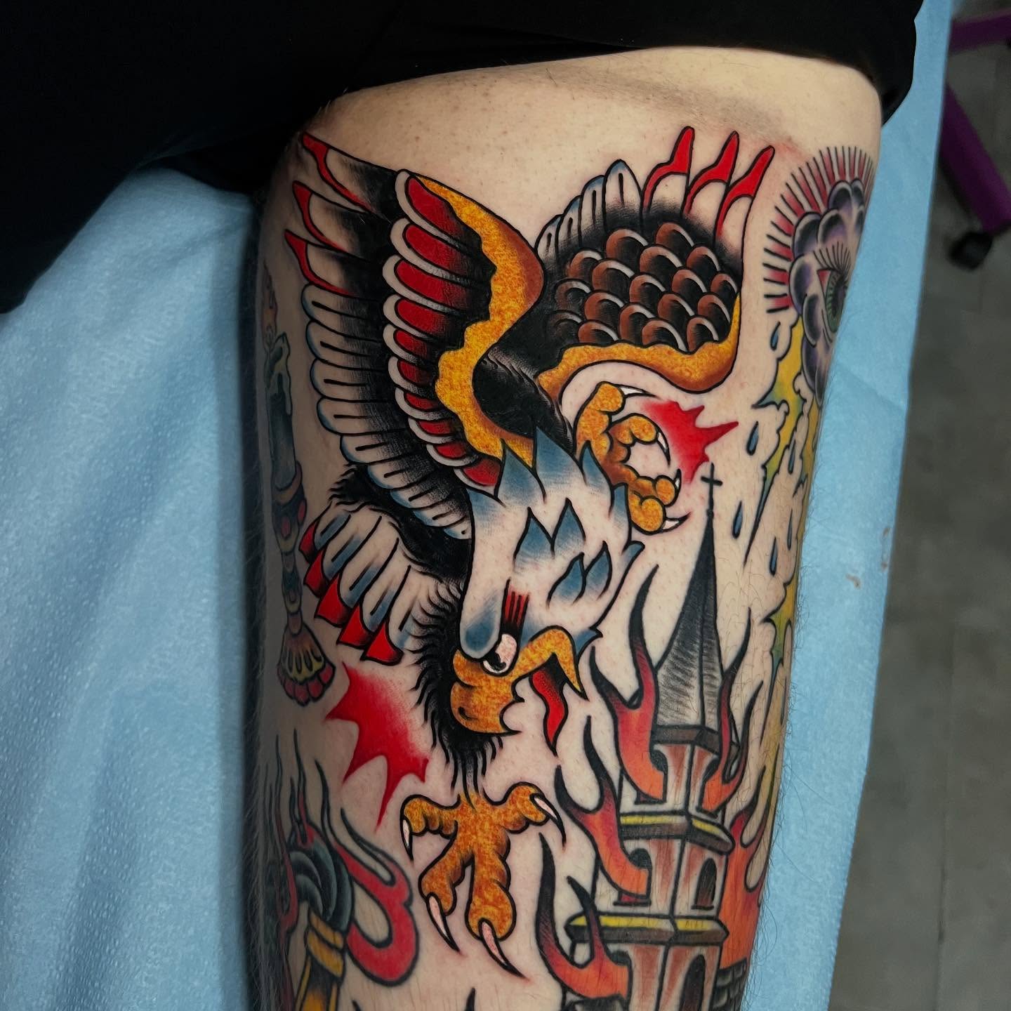 Bird and wolf American traditional tattoo on the thigh by doodle