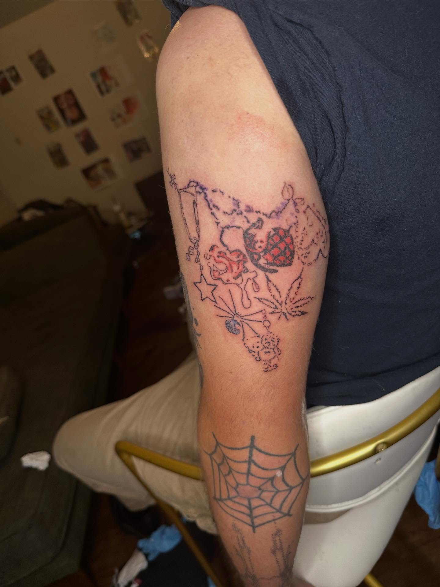 Marijuana leaf and heart American traditional tattoo on the forearm by Swag Originator