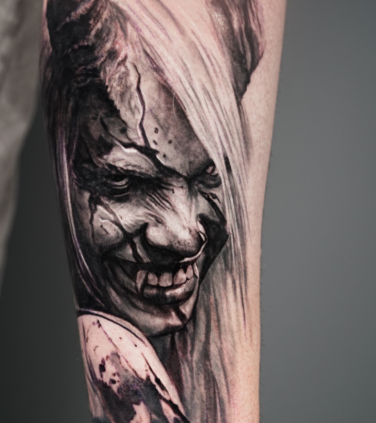 Joker realism tattoo on the forearm by Jose Carlos