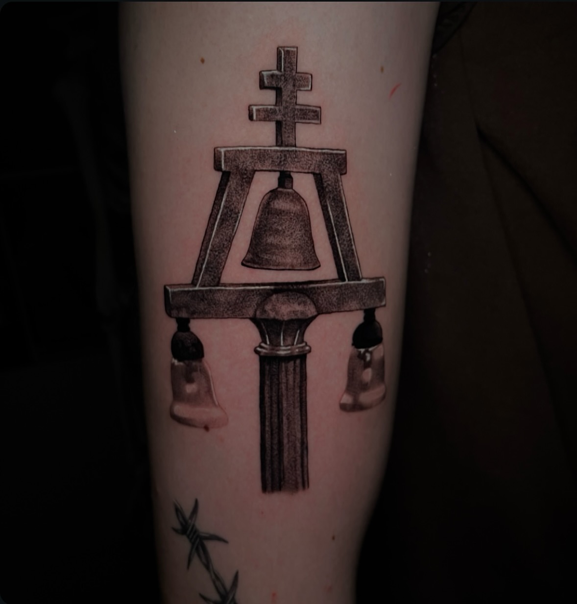 Bell tower black and grey tattoo on the forearm by Chato