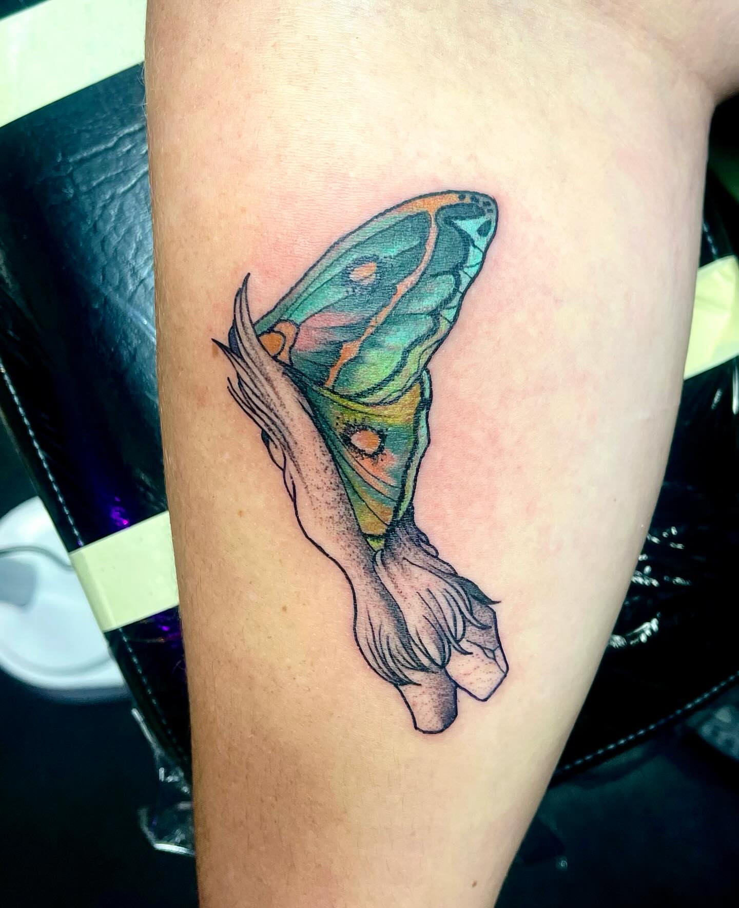Butterfly dotwork tattoo on the forearm by Emily