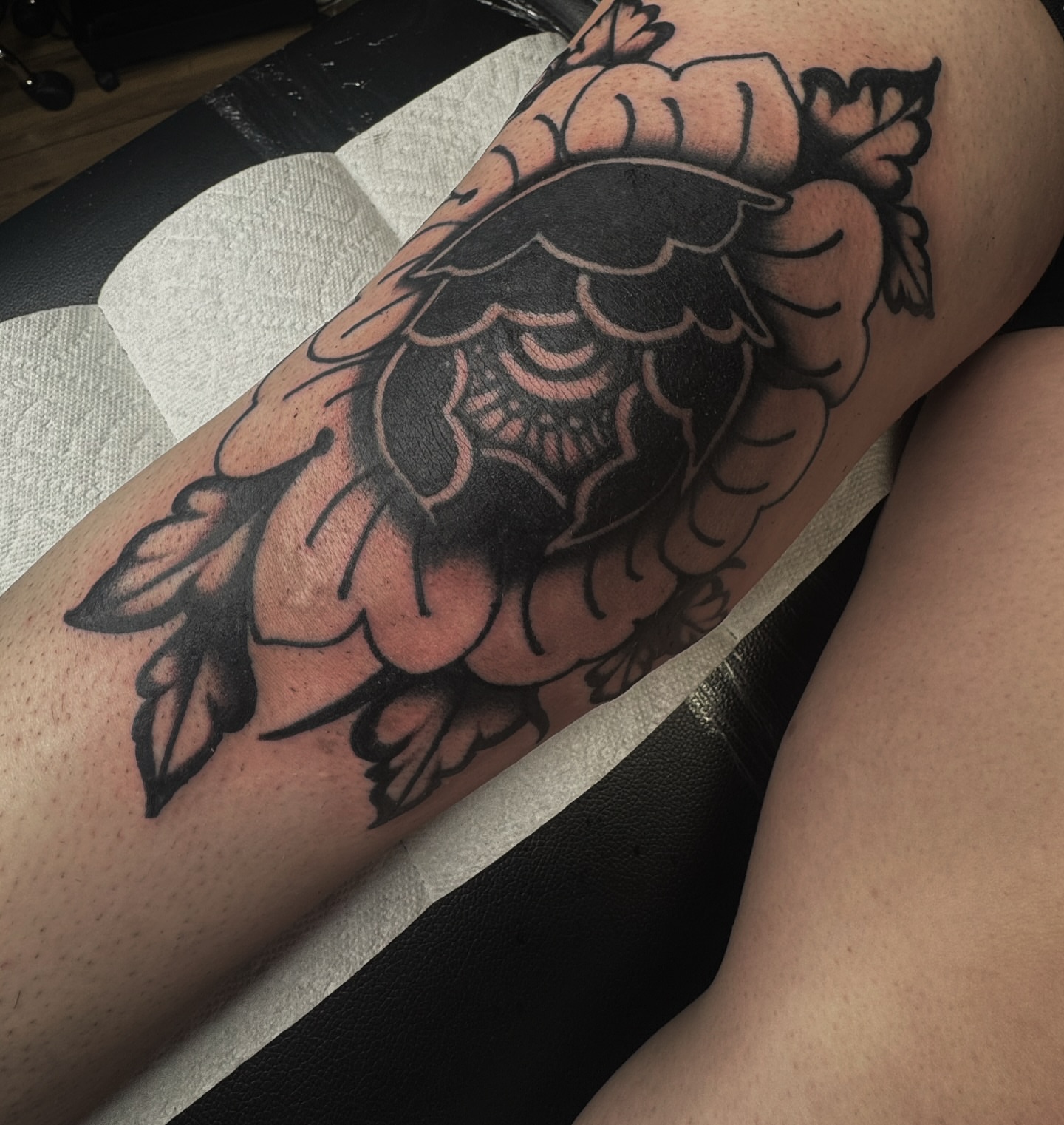 Peony American traditional tattoo on the forearm by Saffron Florea, Tiffin, Ohio