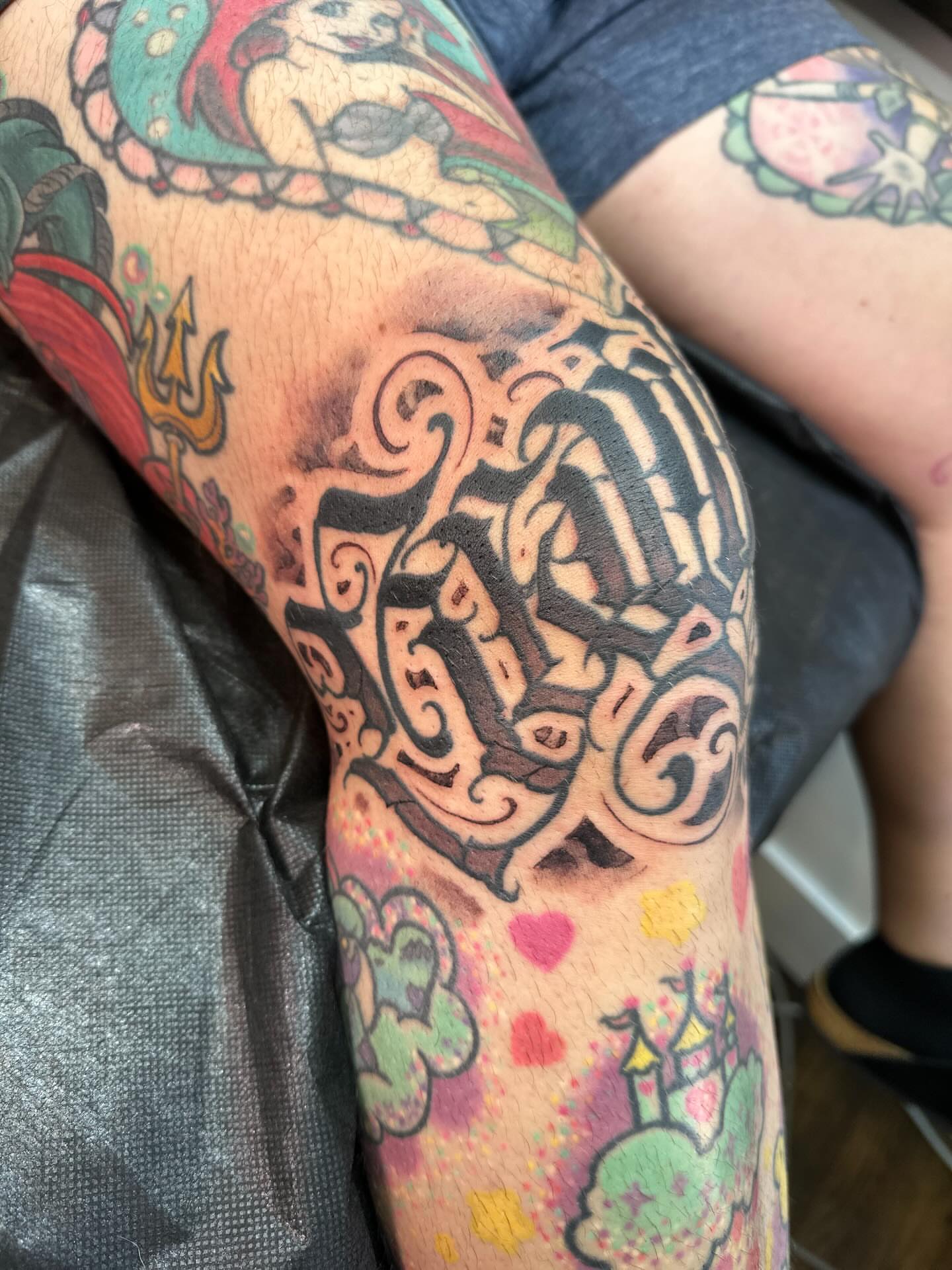 Script lettering American traditional tattoo on the forearm by Tattoos By Deft