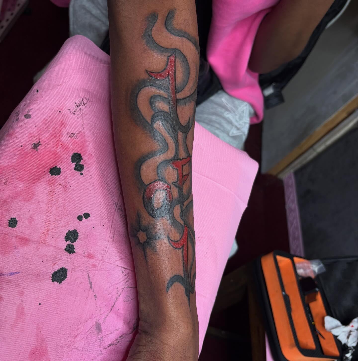 Abstract symbol black and grey tattoo on the forearm by Barbinks Studio🎀