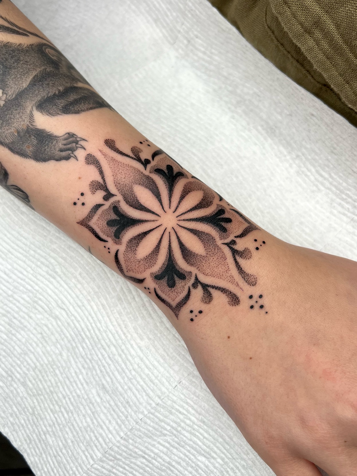 Geometric mandala dotwork tattoo on the forearm by 𝔐𝔦𝔠𝔥𝔢𝔩𝔩𝔢 ℭ𝔥𝔞𝔪𝔢𝔯𝔩𝔦𝔨