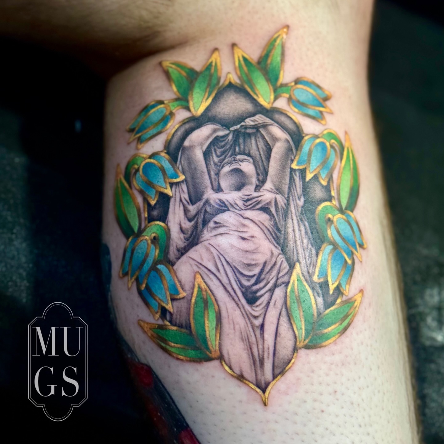 Statue with wreath realism tattoo on the thigh by Emily Andreozzi