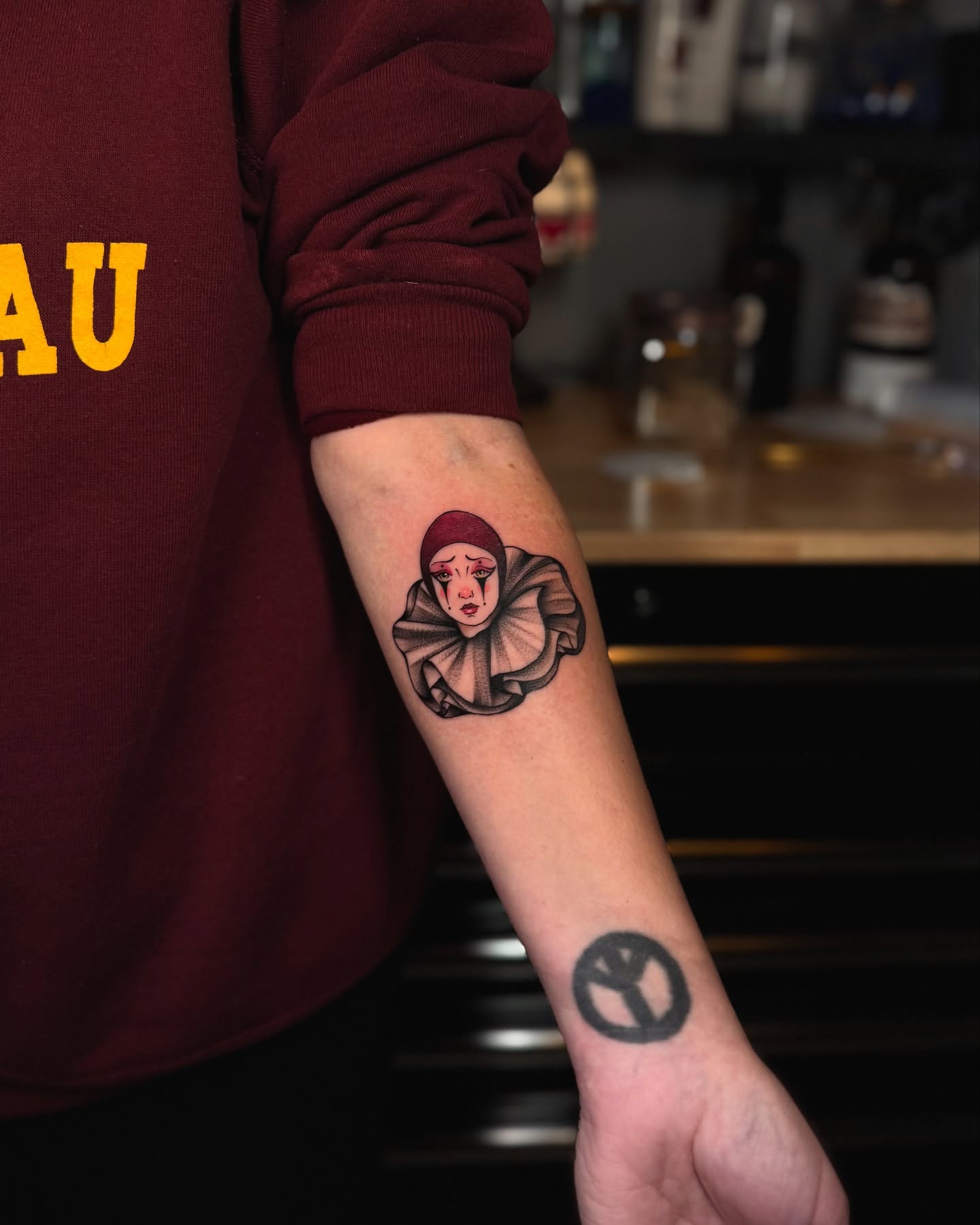 Portrait of a woman realism tattoo on the forearm by laura baldwin
