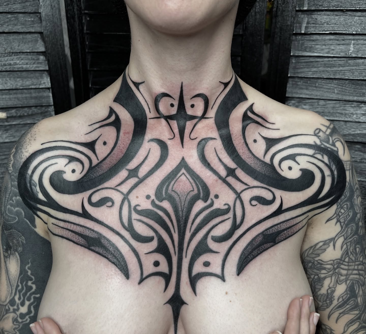 Tribal tribal tattoo on the chest by Michigan Tattoo Artist - Nadia Garver, Clinton Township, Michigan