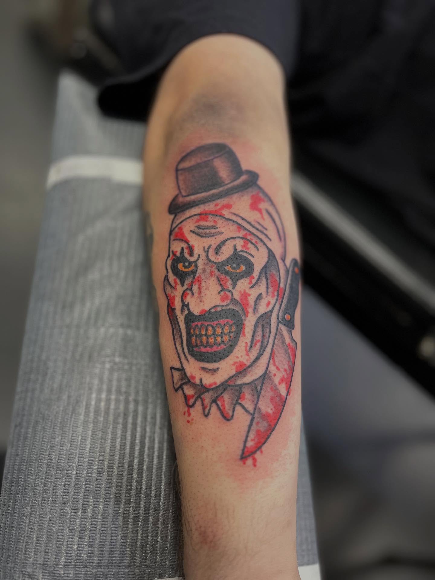 Clown American traditional tattoo on the forearm by CRAIG B⛓️ Cincinnati Tattoo Artist