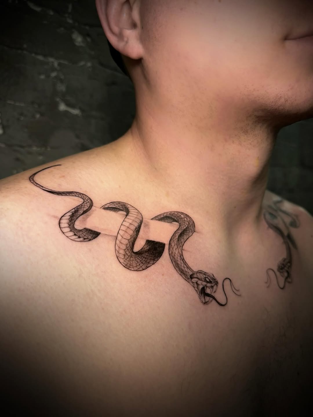 Snake American traditional tattoo on the shoulder by Nyc Tattoo Manhattan