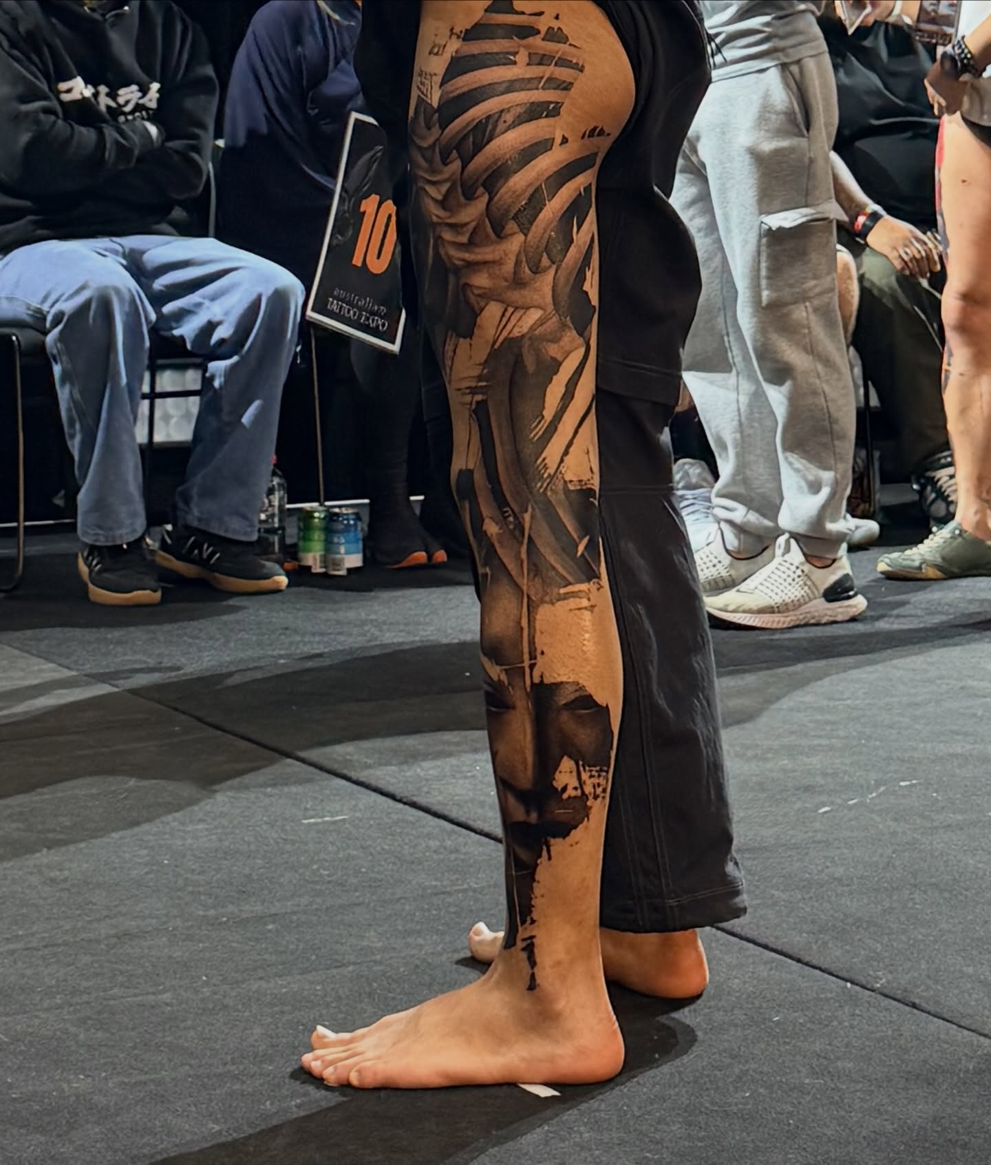Mask black and grey tattoo on the calf by Perth tattoo 류, Perth, Western Australia
