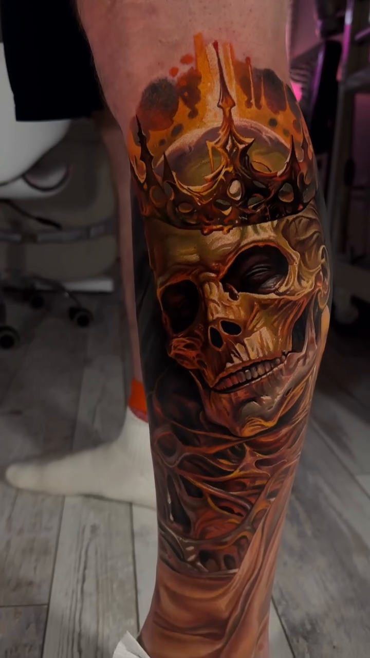 Skull with crown and intricate details dark art tattoo on the calf by Dmitriy Paramonov πΊπ¦