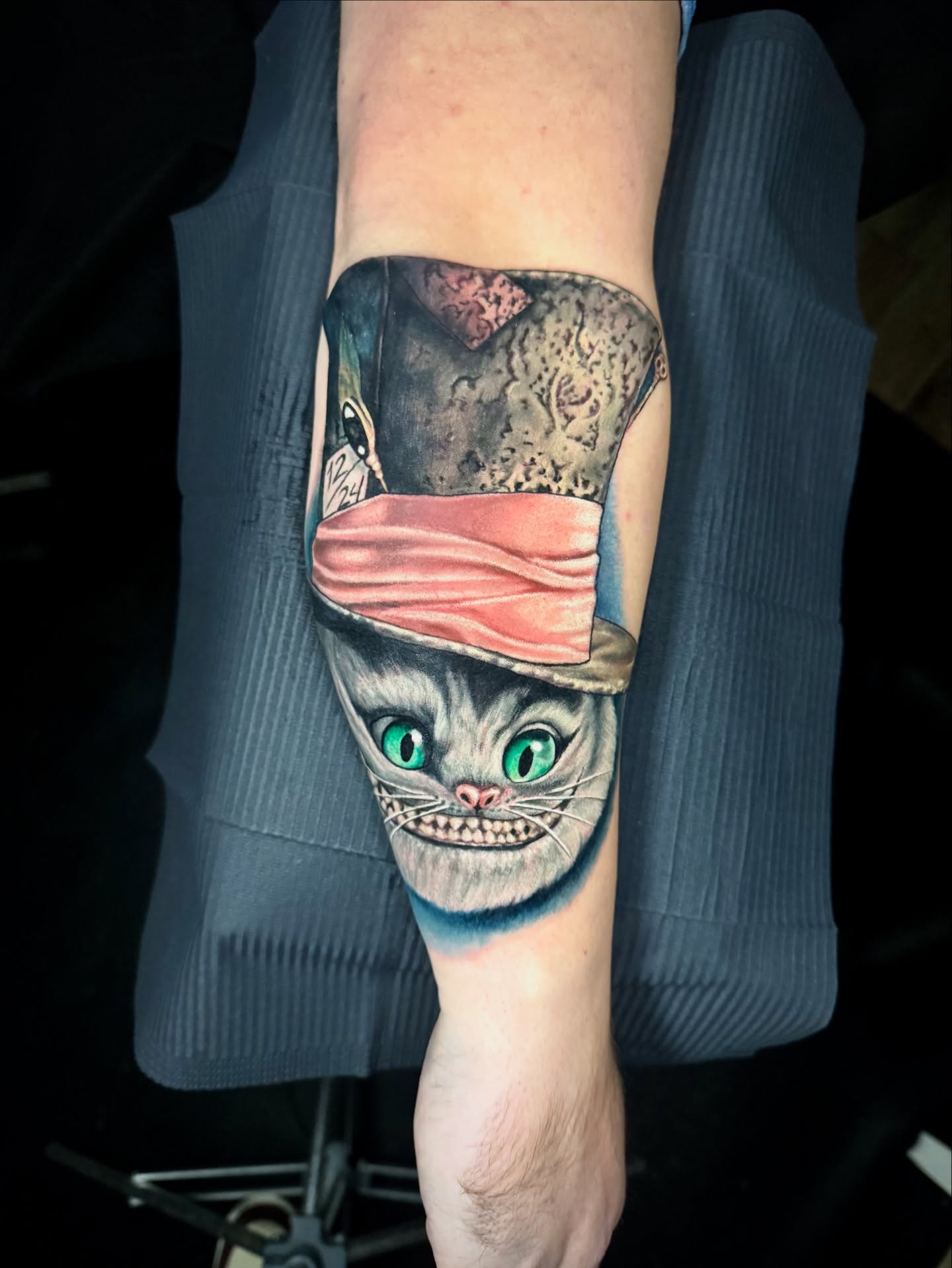 Cat realism tattoo on the forearm by Kevin Boudreau Newschool Tattoos