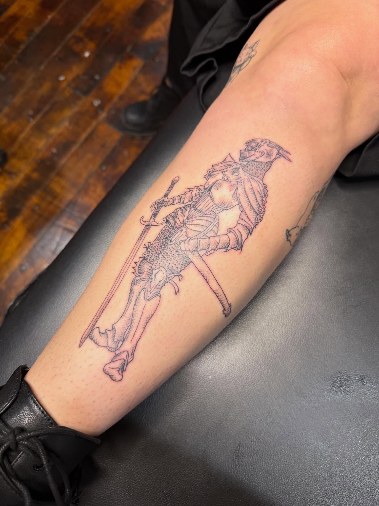 Warrior black and grey tattoo on the forearm by Mike Nappi