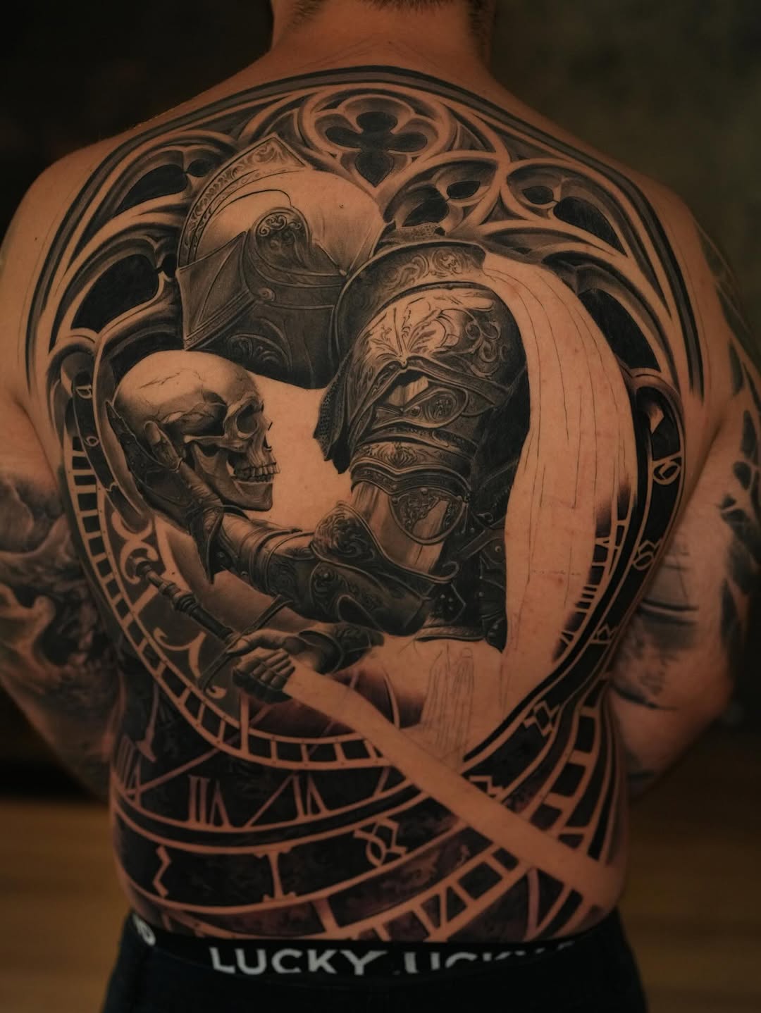 Tattoo by @nogarolli_tattoo — realism, black_and_grey