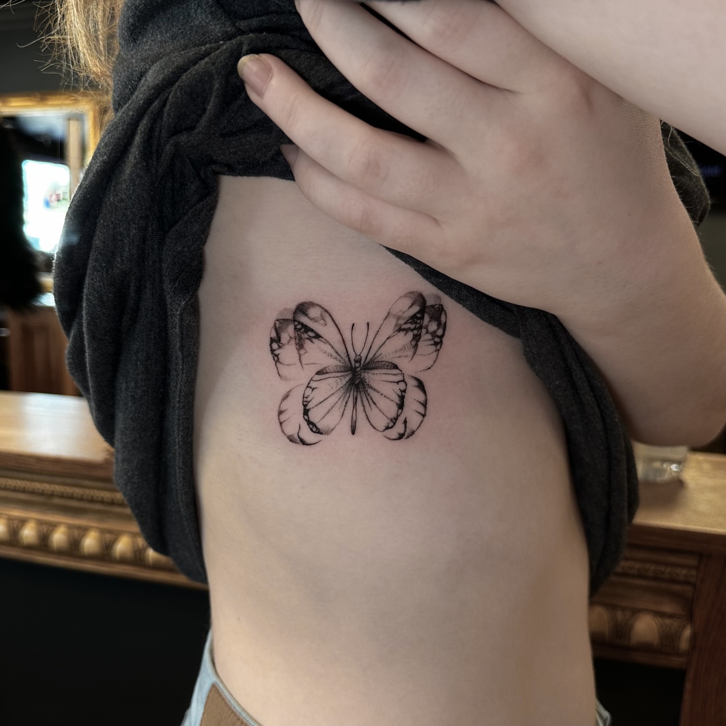 Butterfly black and grey tattoo on the ribs by Leo Fernandes, Danvers, Massachusetts